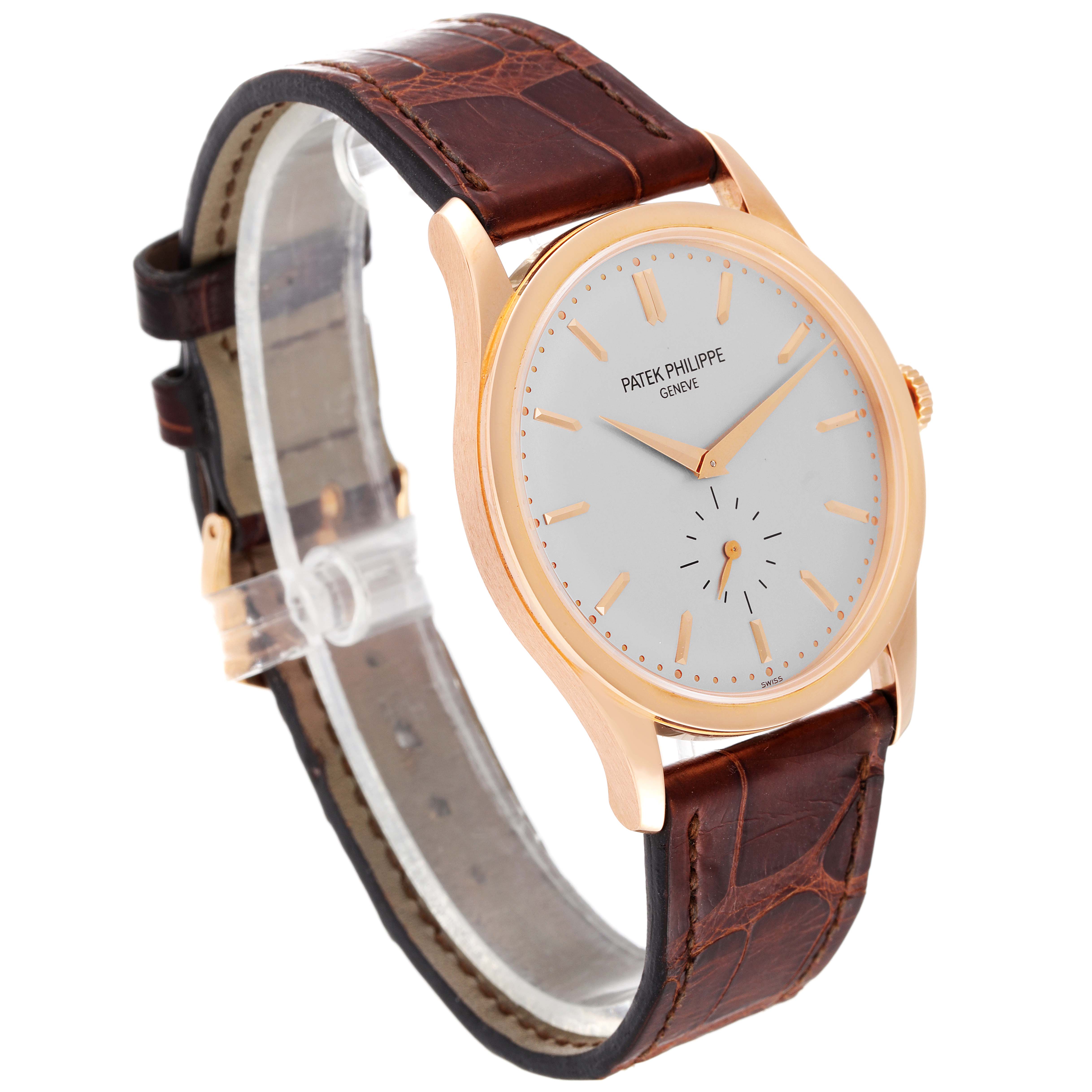This image shows a side angle of the Patek Philippe Calatrava 5196R Men's Rose Gold Silver Dial 5196R Men's Rose Gold Silver Dial watch, featuring its face, bezel, and brown leather strap.