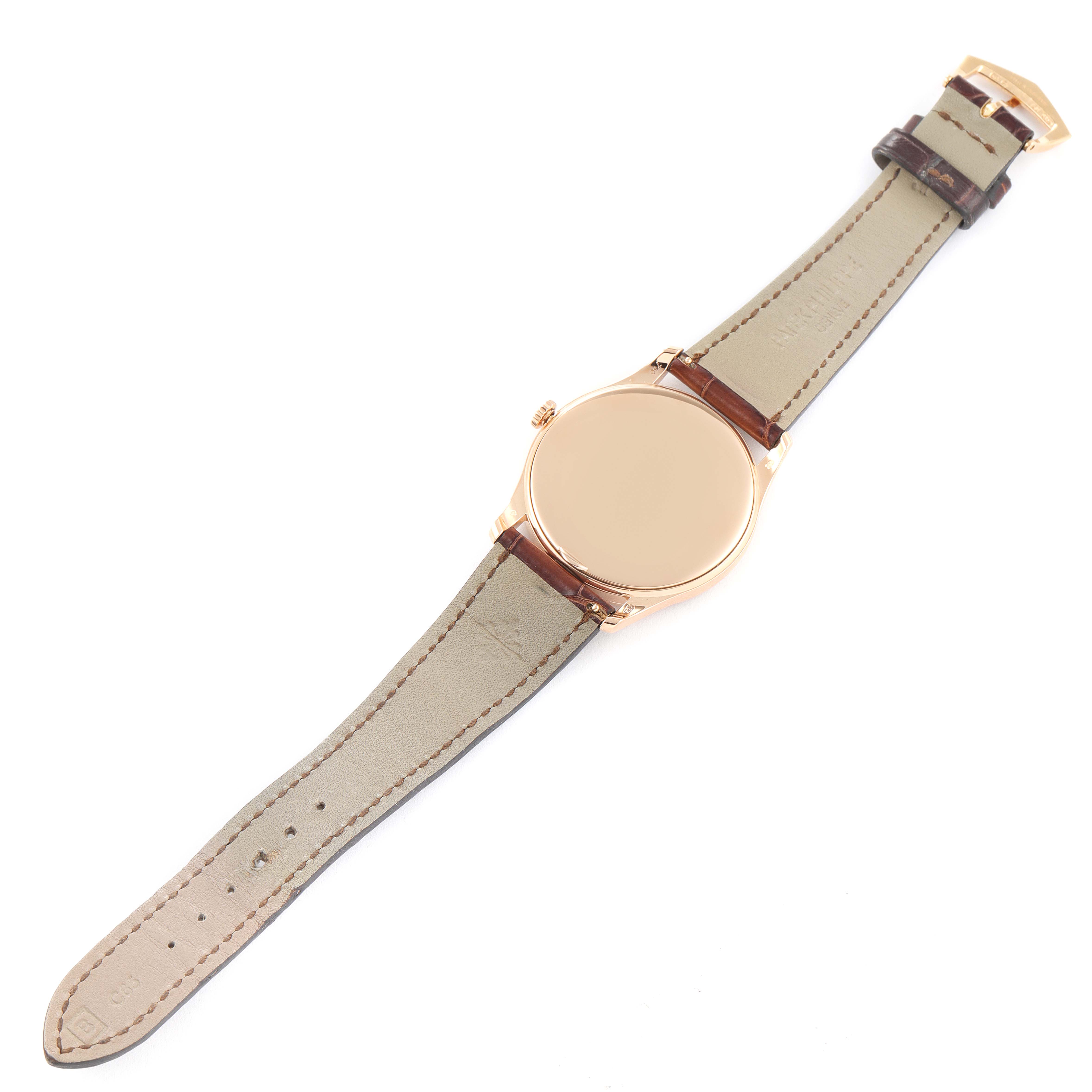 The image shows the back and band of a Patek Philippe Calatrava 5196R Men's Rose Gold Silver Dial 5196R Men's Rose Gold Silver Dial watch, viewed from above.