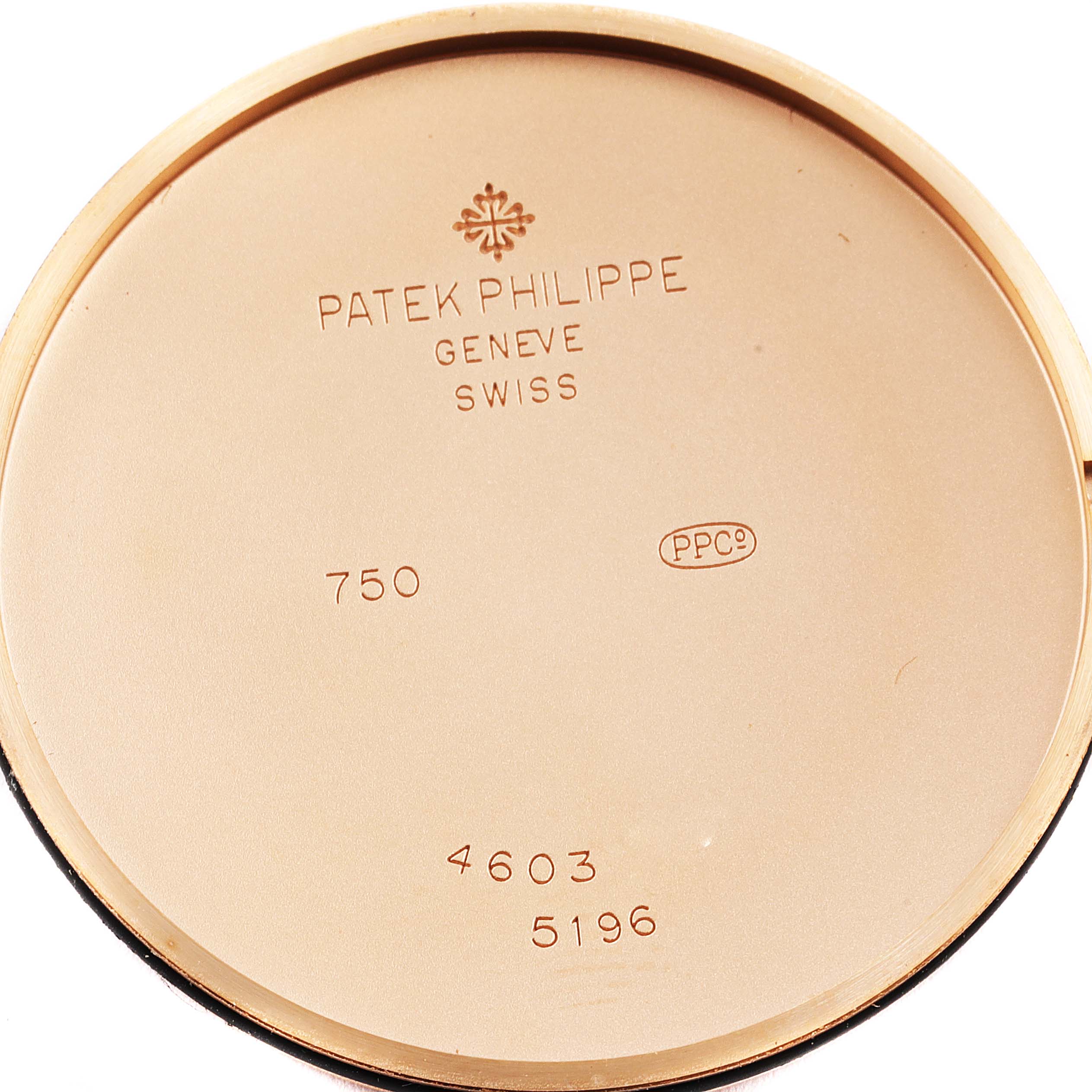 The image shows the back case interior of a Patek Philippe Calatrava 5196R Men's Rose Gold Silver Dial 5196R Men's Rose Gold Silver Dial watch with inscriptions and hallmarks.