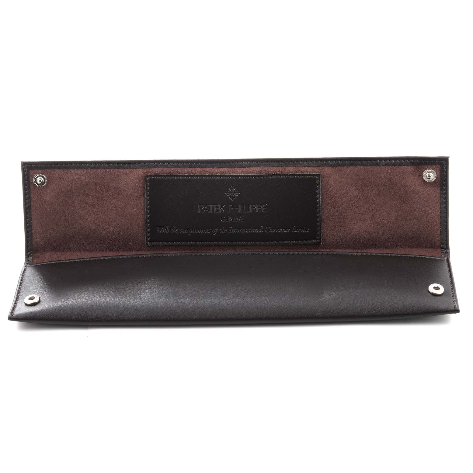 This image shows an open leather case for the Patek Philippe Calatrava 5119R Men
s Rose Gold White Dial 5119R Men
s Rose Gold White Dial watch, featuring the brand
s logo and message inside.