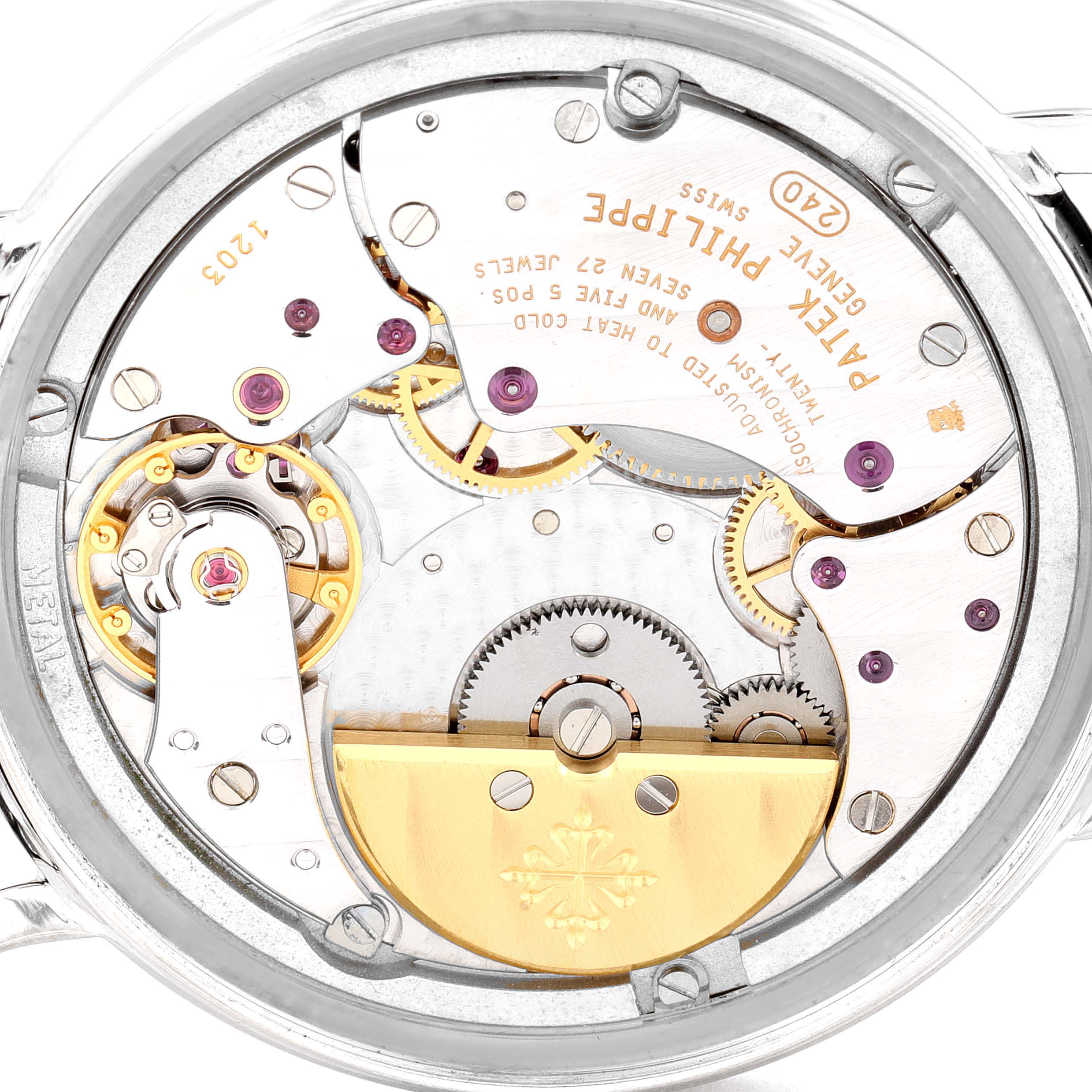 The image shows a detailed view of the movement mechanism inside a Patek Philippe Calatrava 5120G Men
s White Gold White Dial 5120G Men
s White Gold White Dial watch, highlighting gears and components.