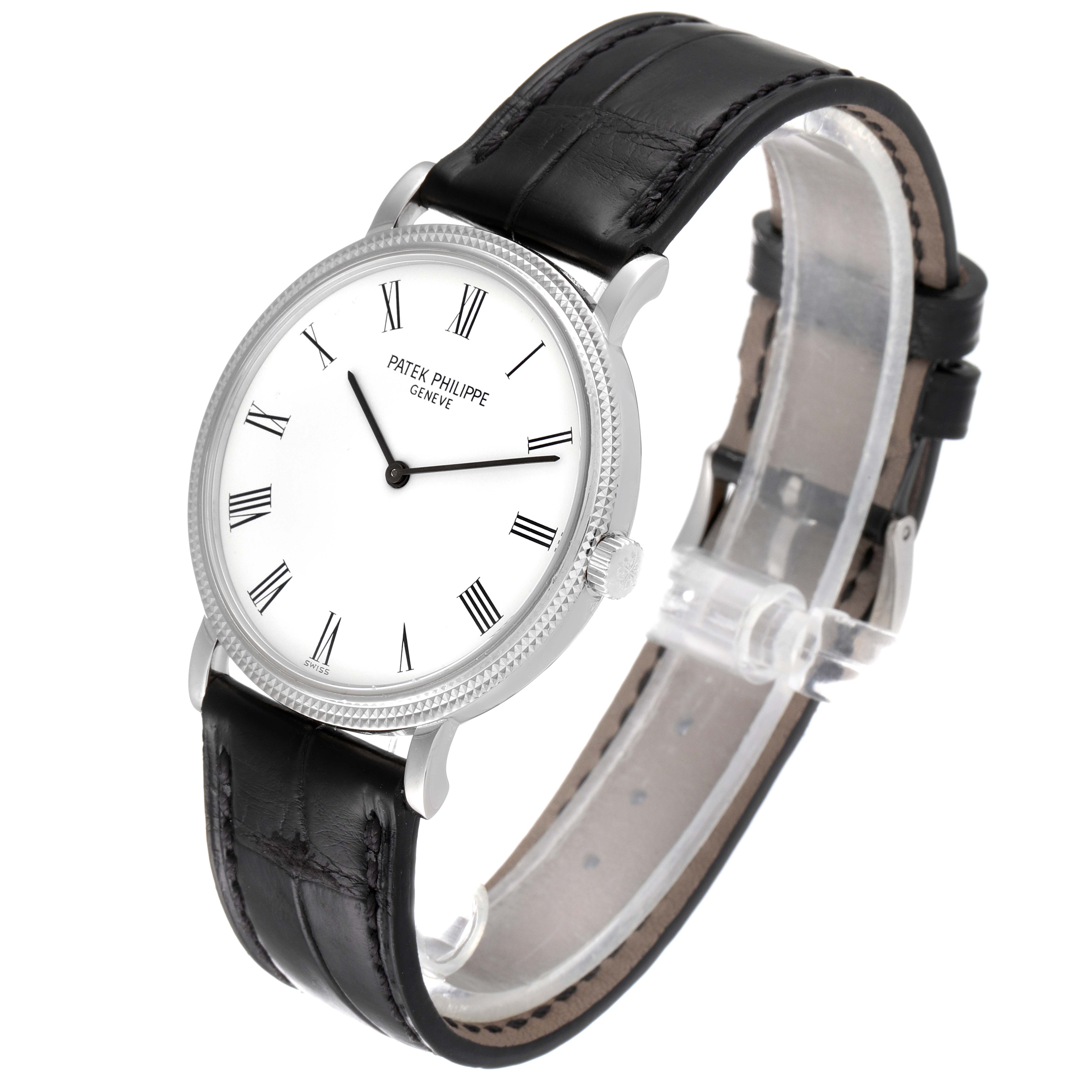 The image shows a Patek Philippe Calatrava 5120G Men
s White Gold White Dial 5120G Men
s White Gold White Dial watch at a three-quarter angle, highlighting the dial, case, and strap.