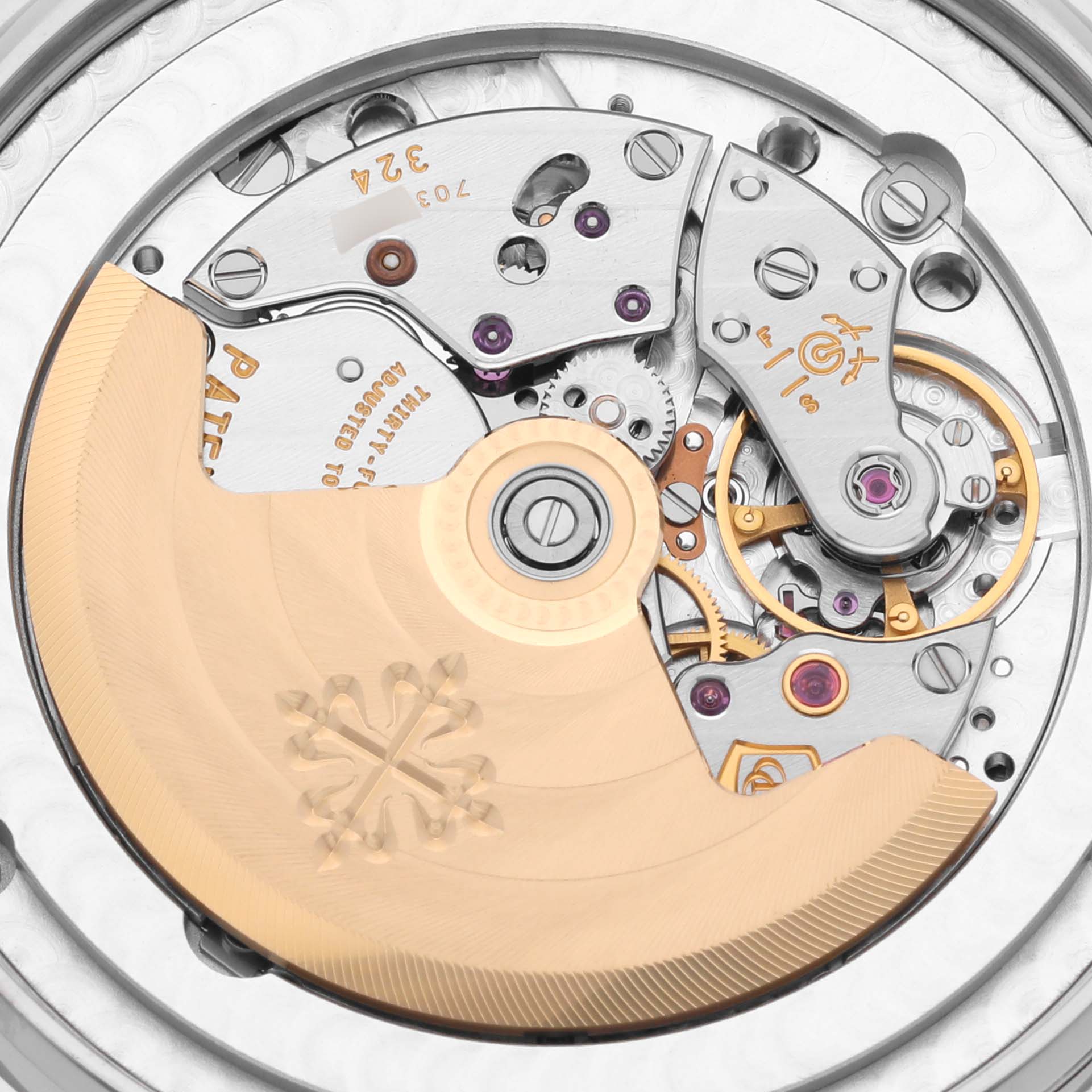 The image shows a detailed close-up of the movement mechanism and rotor of a Patek Philippe Complications 5396G-014 Men's White Gold Grey Dial 5396G-014 Men's White Gold Grey Dial watch.