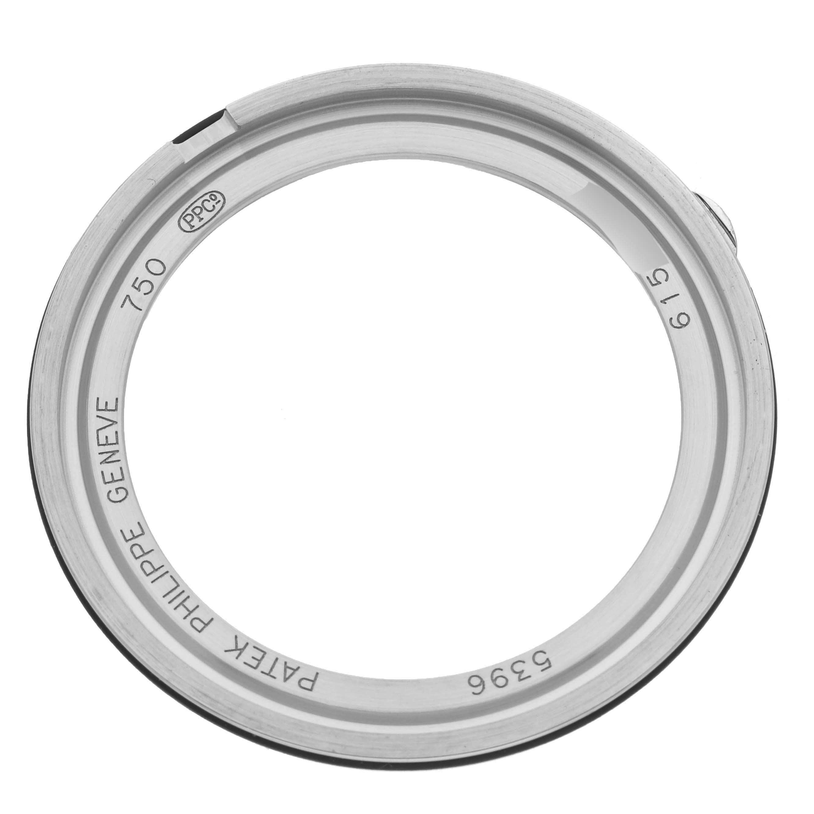 The image shows the case back of a Patek Philippe Complications 5396G-014 Men's White Gold Grey Dial 5396G-014 Men's White Gold Grey Dial model, viewed from above.