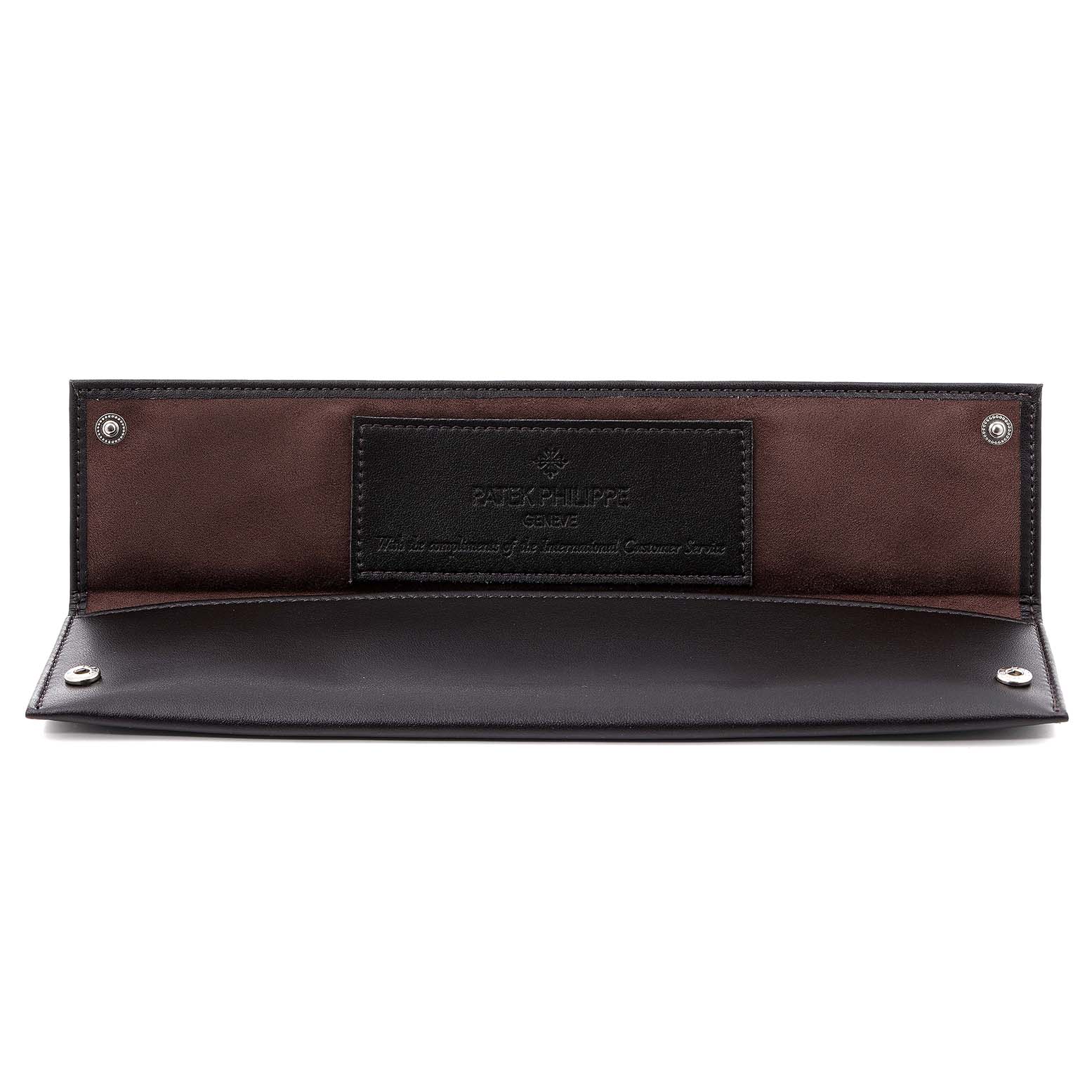 This is a top view of a Patek Philippe Golden Ellipse 3948 Men's Yellow Gold White Dial 3948 Men's Yellow Gold White Dial watch leather case, open to display the interior compartments.