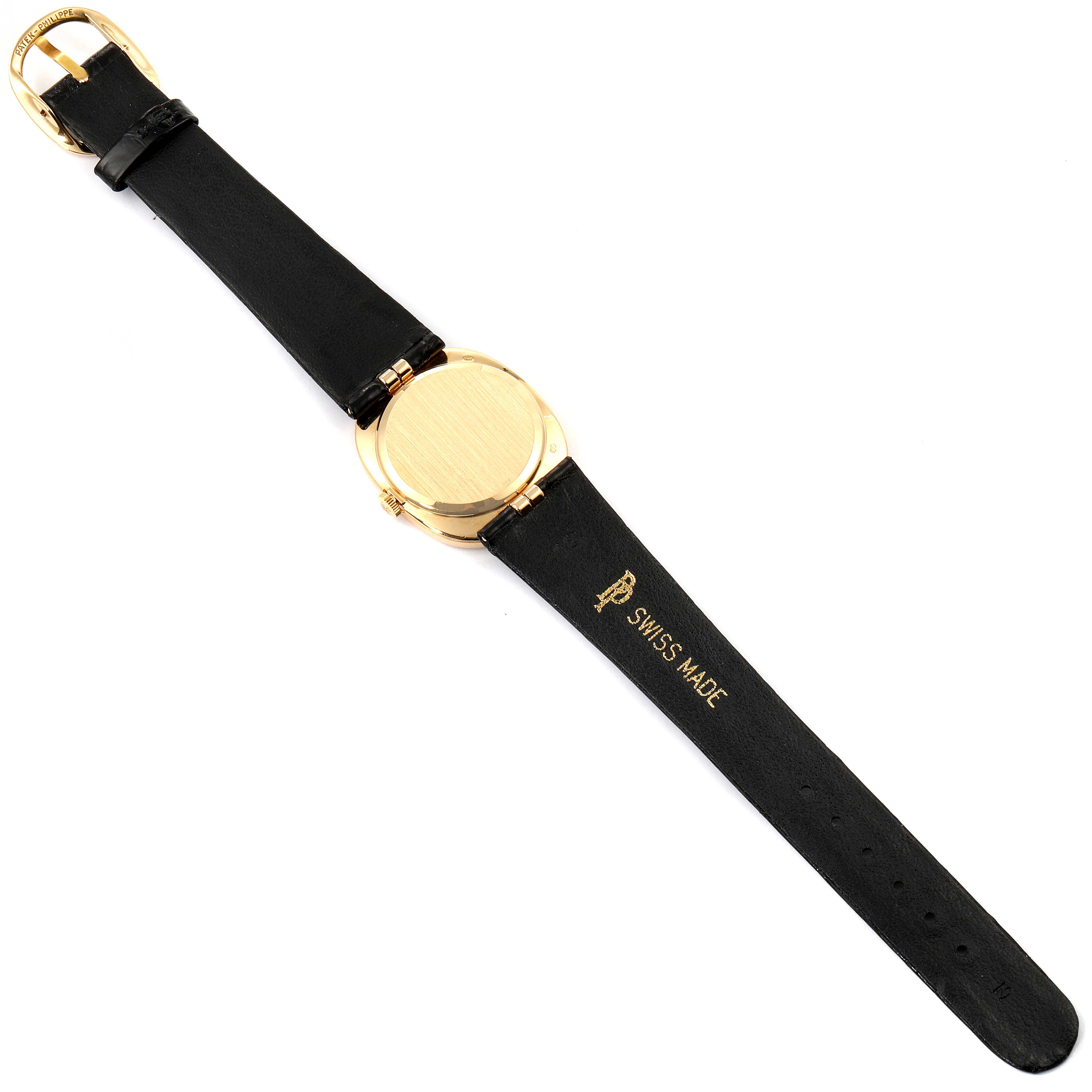 This image shows the back view of a Patek Philippe Golden Ellipse 3948 Men's Yellow Gold White Dial 3948 Men's Yellow Gold White Dial watch, highlighting its case and black leather strap.