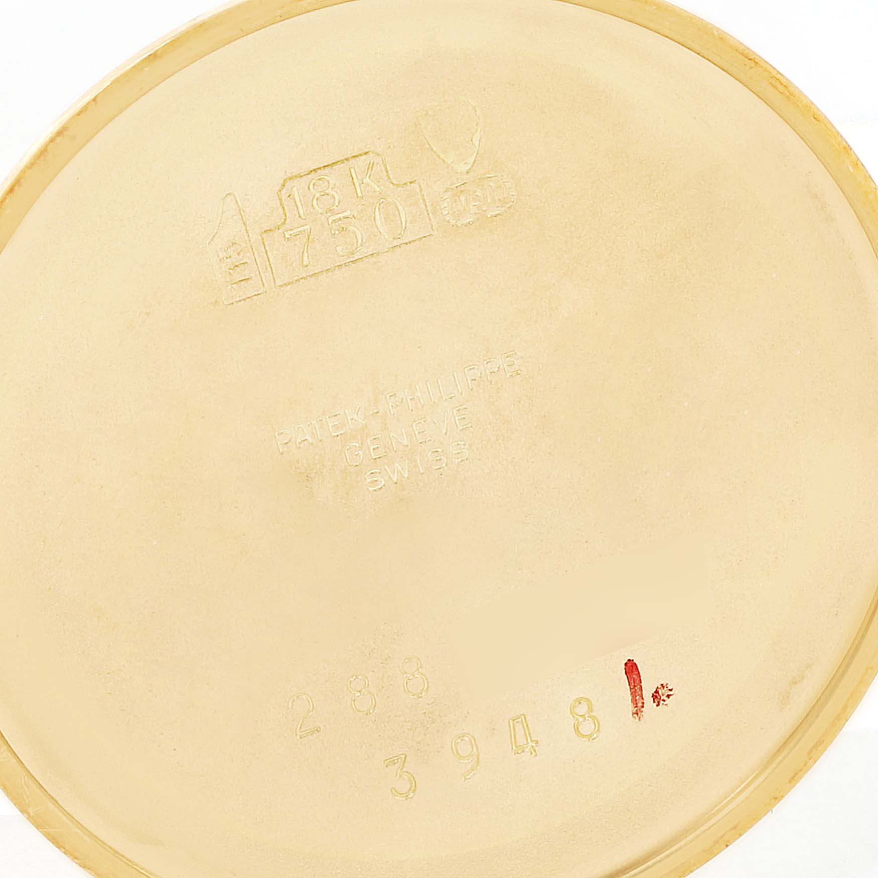 The image shows the inner case back of a Patek Philippe Golden Ellipse 3948 Men's Yellow Gold White Dial 3948 Men's Yellow Gold White Dial watch, marked with hallmarks and engravings.