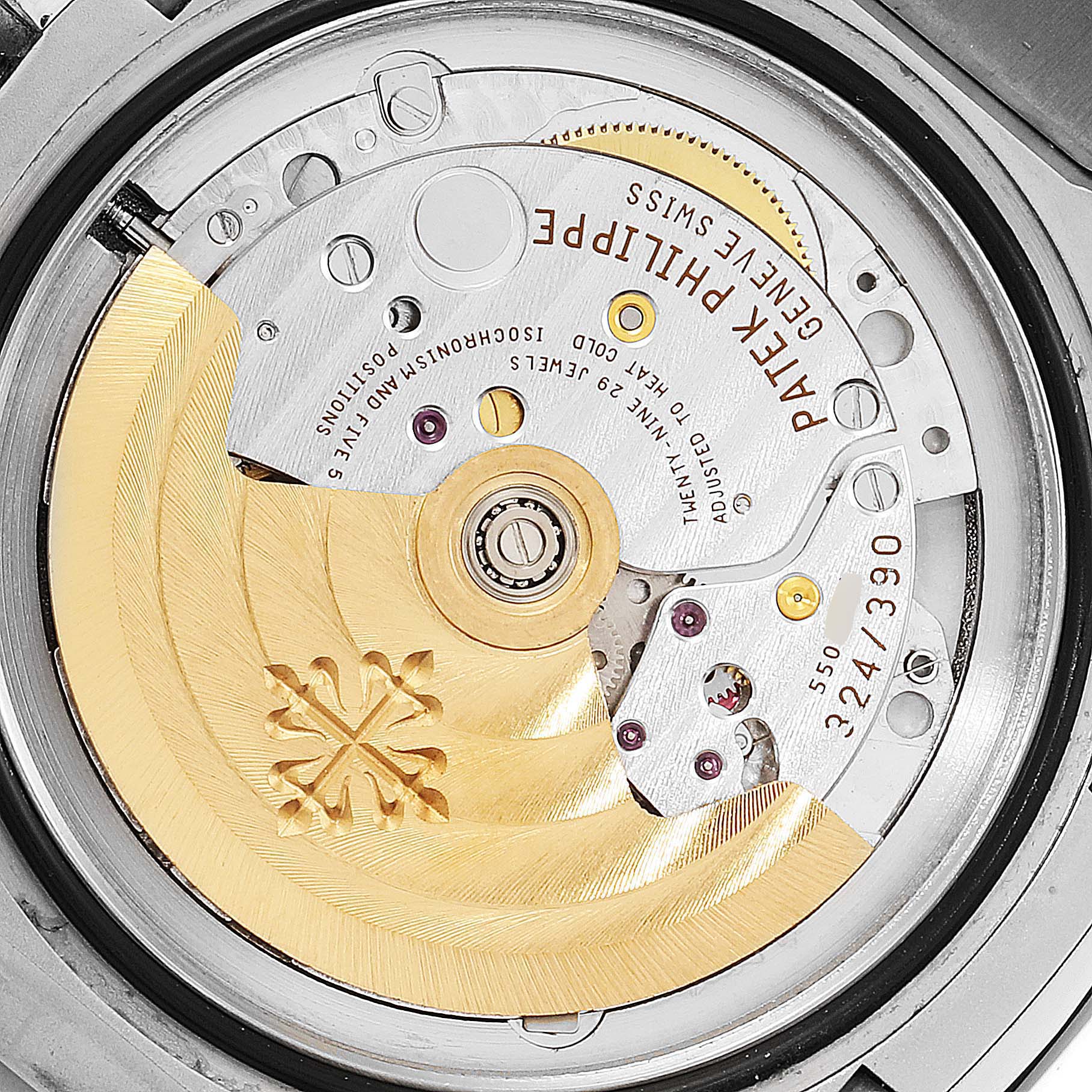 This close-up image shows the intricate movement mechanism of a Patek Philippe Nautilus 5711/1A-010 Men's Stainless Steel Blue Dial 5711/1A-010 Men's Stainless Steel Blue Dial watch.