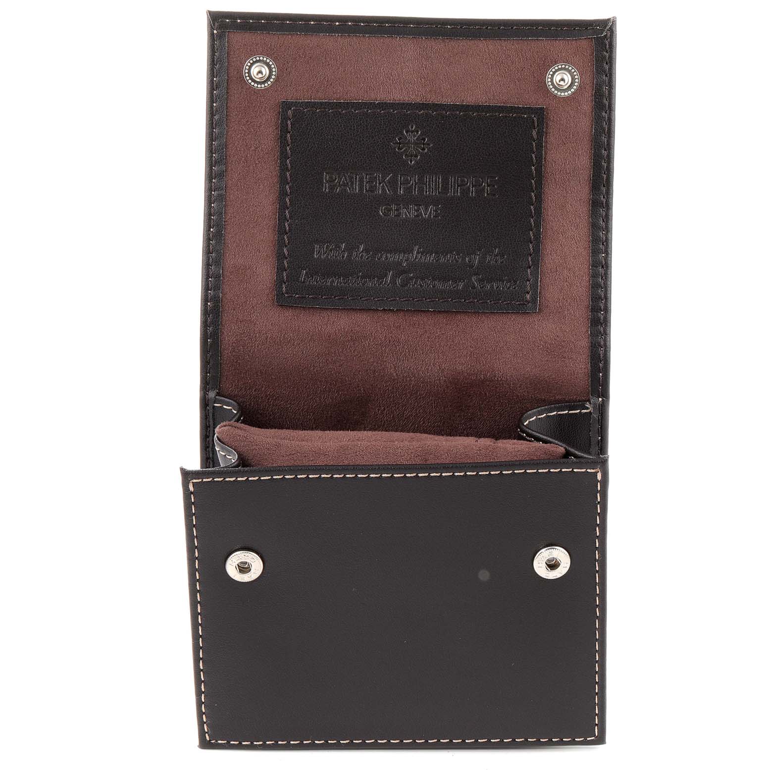 The image shows an open leather case for the Complications model by Patek Philippe, displaying the lining and brand logo.