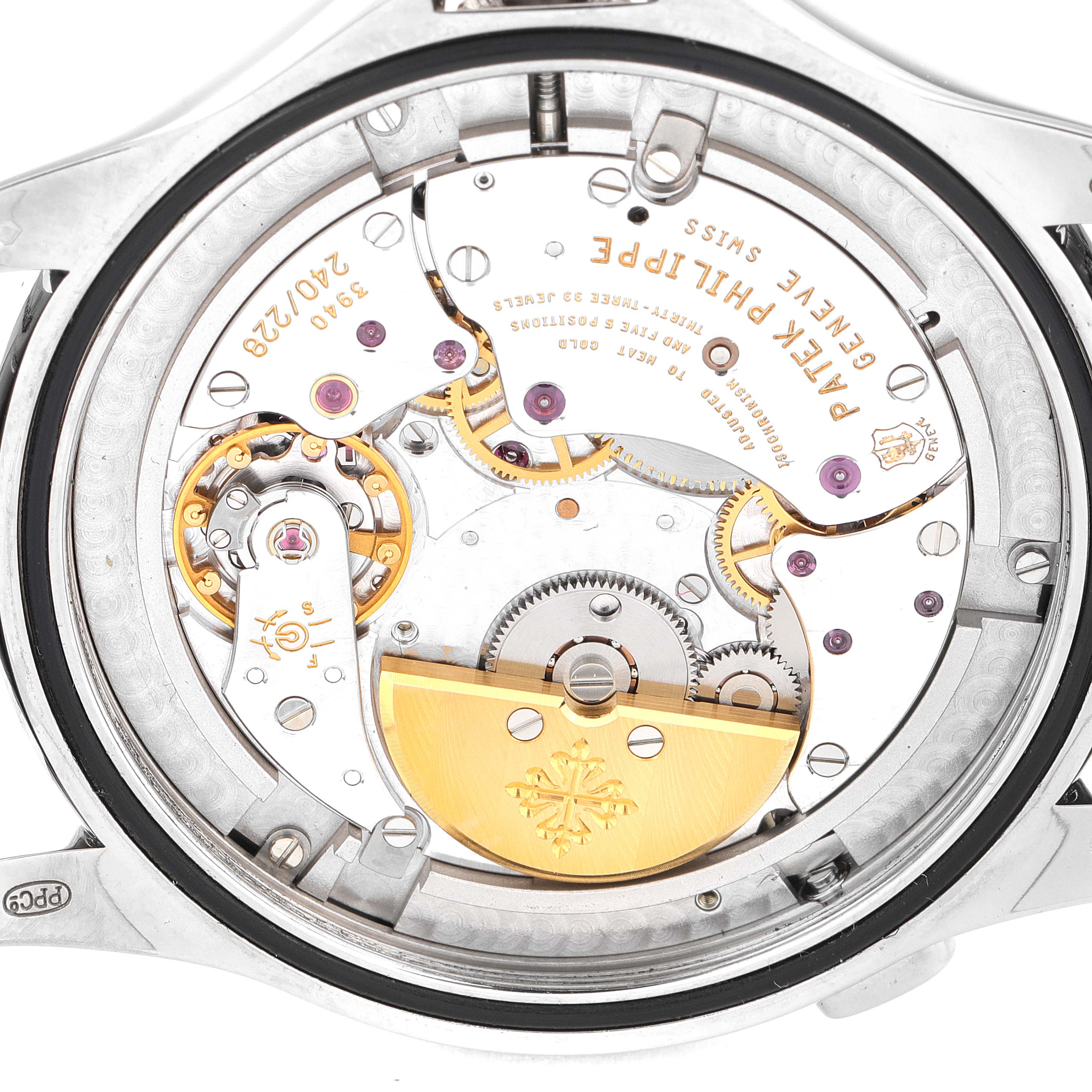 This image shows the back angle of a Patek Philippe Complications 5130G-019 Men's Stainless Steel Silver Dial 5130G-019 Men's Stainless Steel Silver Dial watch, highlighting its internal mechanical components.