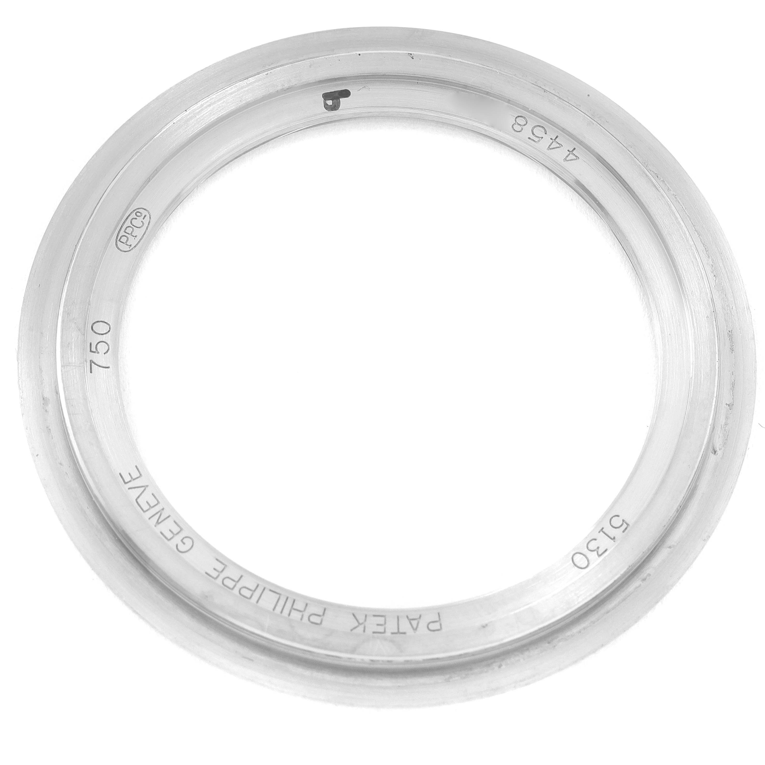 This image shows a circular bezel seen from a top-down view, labeled "750," "Patek Philippe," for the Complications model.