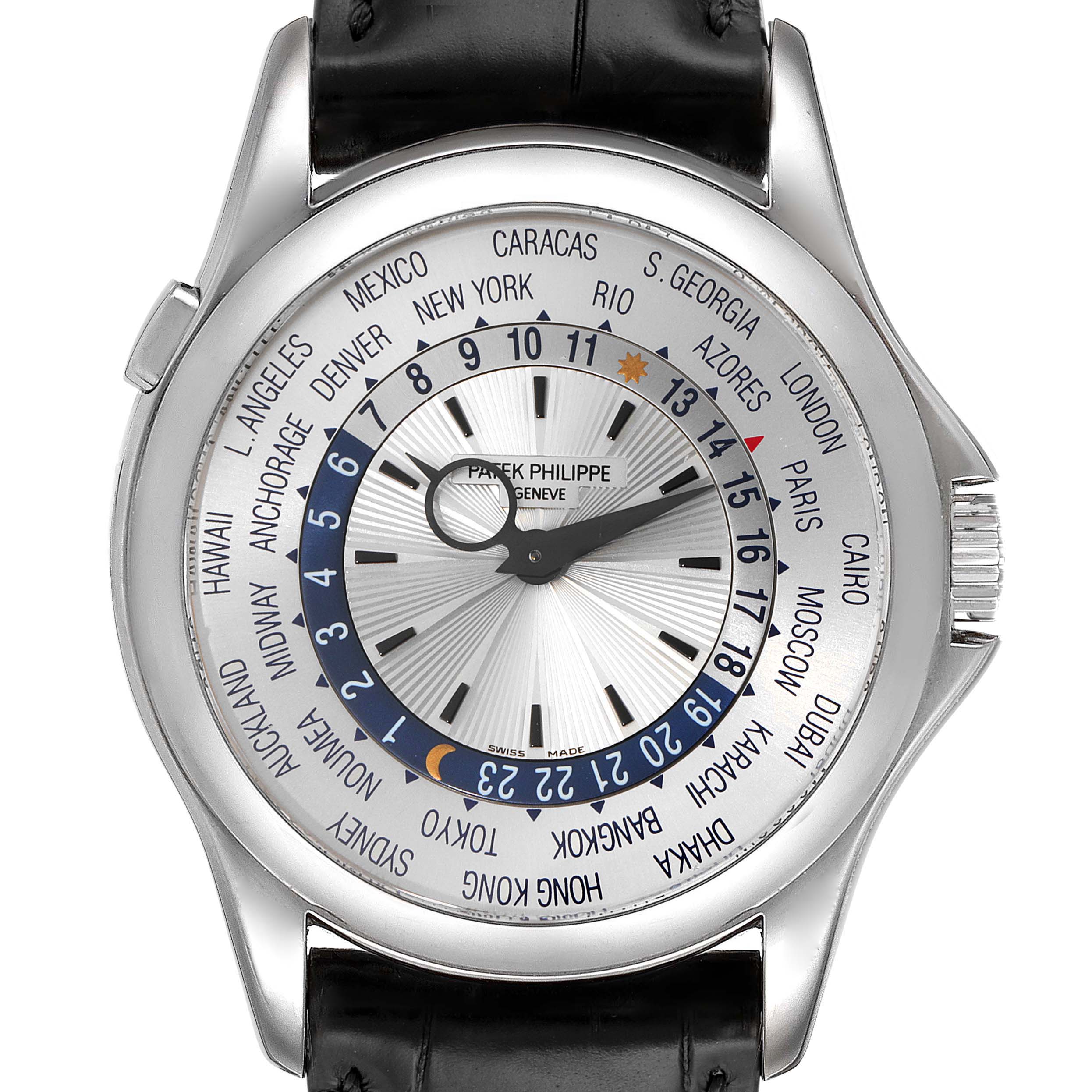 The image shows a front view of the Patek Philippe Complications 5130G-019 Men's Stainless Steel Silver Dial 5130G-019 Men's Stainless Steel Silver Dial watch model, highlighting its world time dial and leather strap.