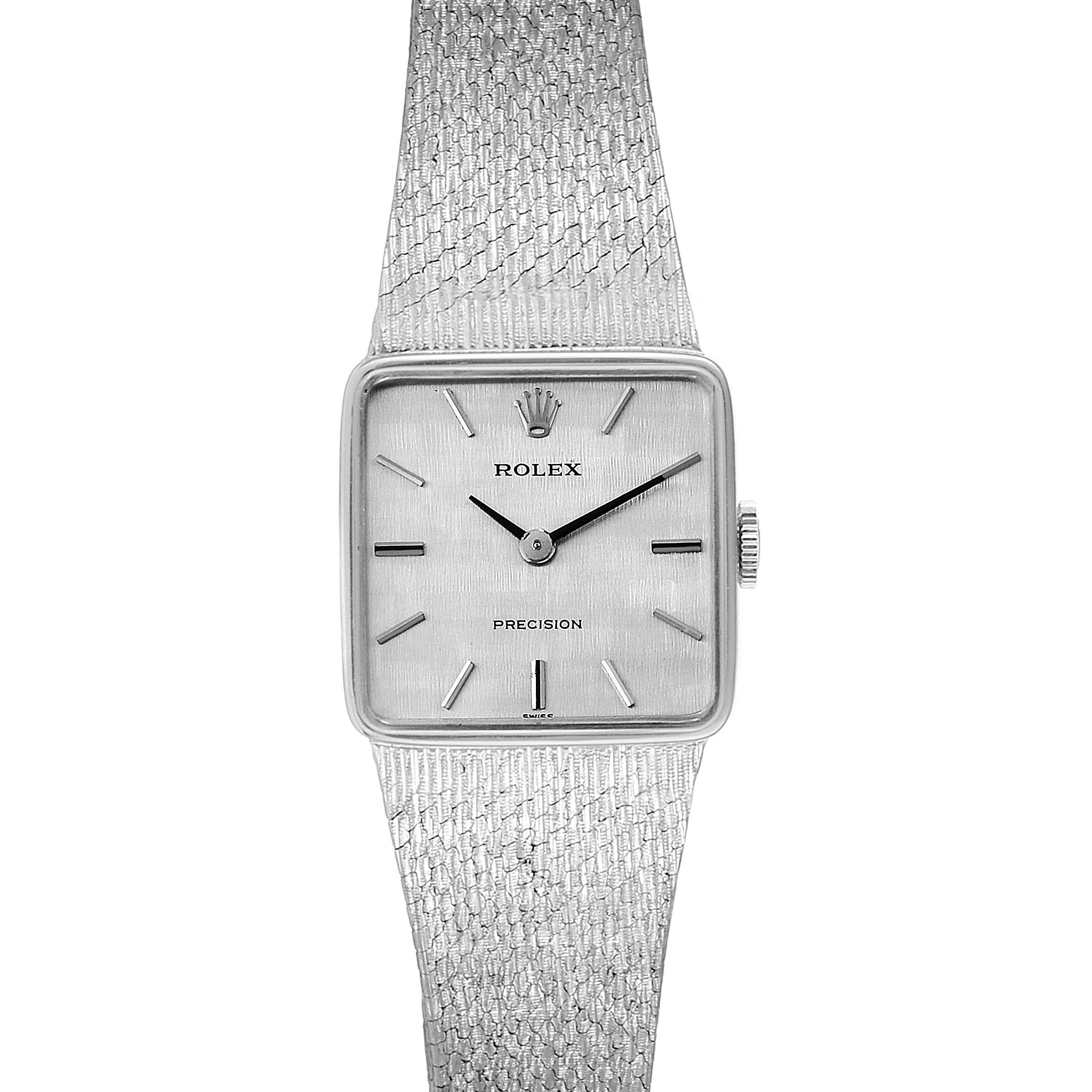 The image shows a head-on view of a Rolex Cellini 285 Women's White Gold Silver Dial 285 Women's White Gold Silver Dial watch, displaying its square face, dial, and textured metal strap.