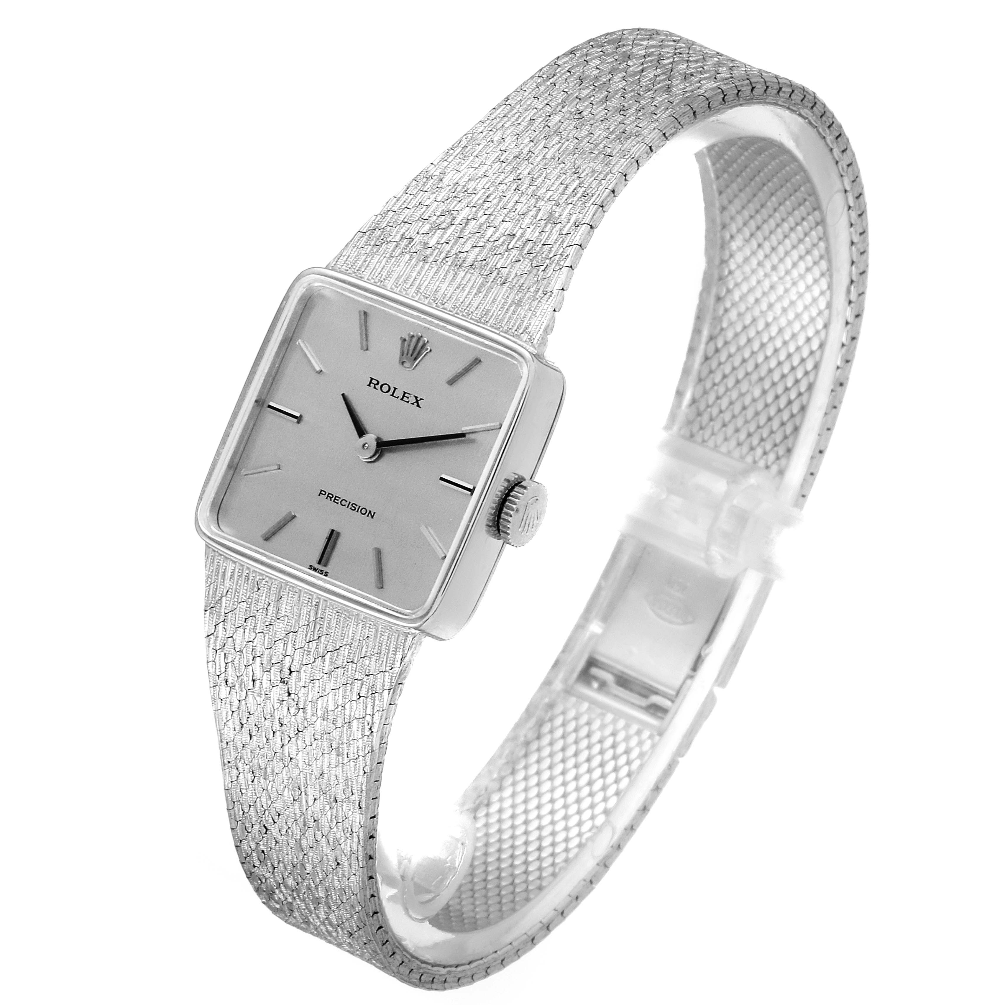 The Rolex Cellini 285 Women's White Gold Silver Dial 285 Women's White Gold Silver Dial model is shown at a slight angle, highlighting its square face, mesh band, and crown.