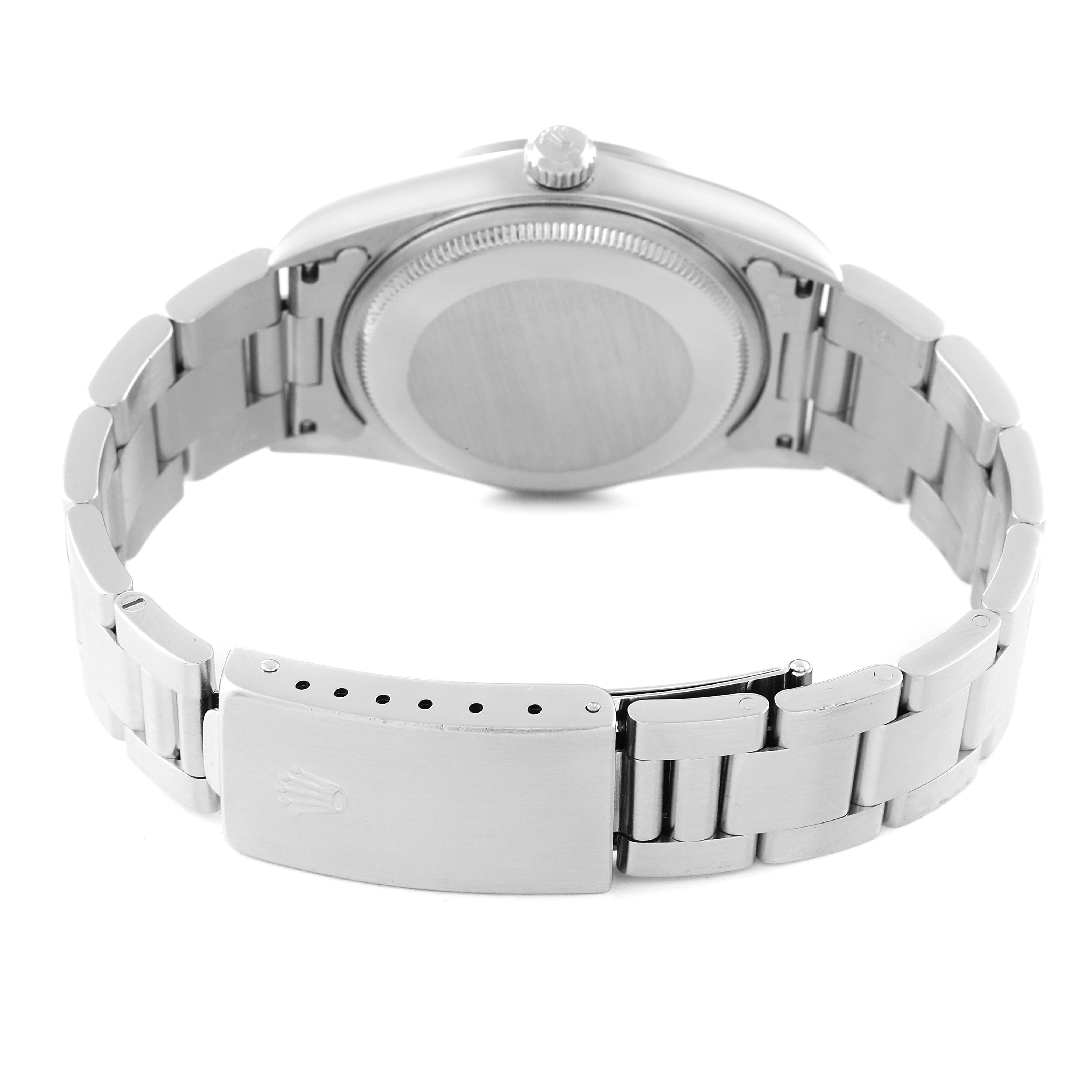 The image shows the back view of a Rolex Air-King 14000 Men's Stainless Steel Pink Dial 14000 Men's Stainless Steel Pink Dial watch, highlighting its metal bracelet and clasp.