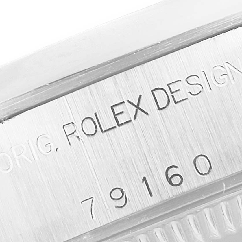 This close-up image shows the engraved model number and "Rolex Design" text on the side of a Rolex Date 79160 Women
s Stainless Steel Pink Dial 79160 Women
s Stainless Steel Pink Dial model watch case.