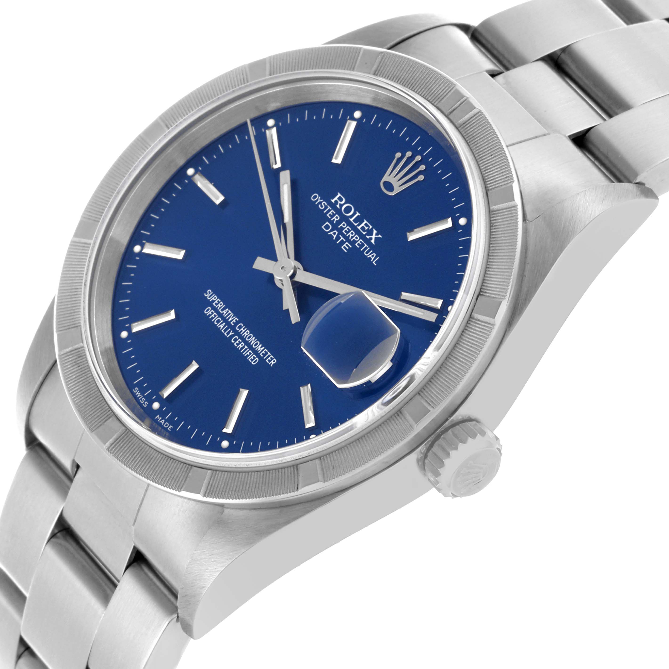The Rolex Date 15210 Men's Stainless Steel Blue Dial 15210 Men's Stainless Steel Blue Dial watch is shown from a side angle, highlighting the blue dial, bezel, bracelet, and crown.