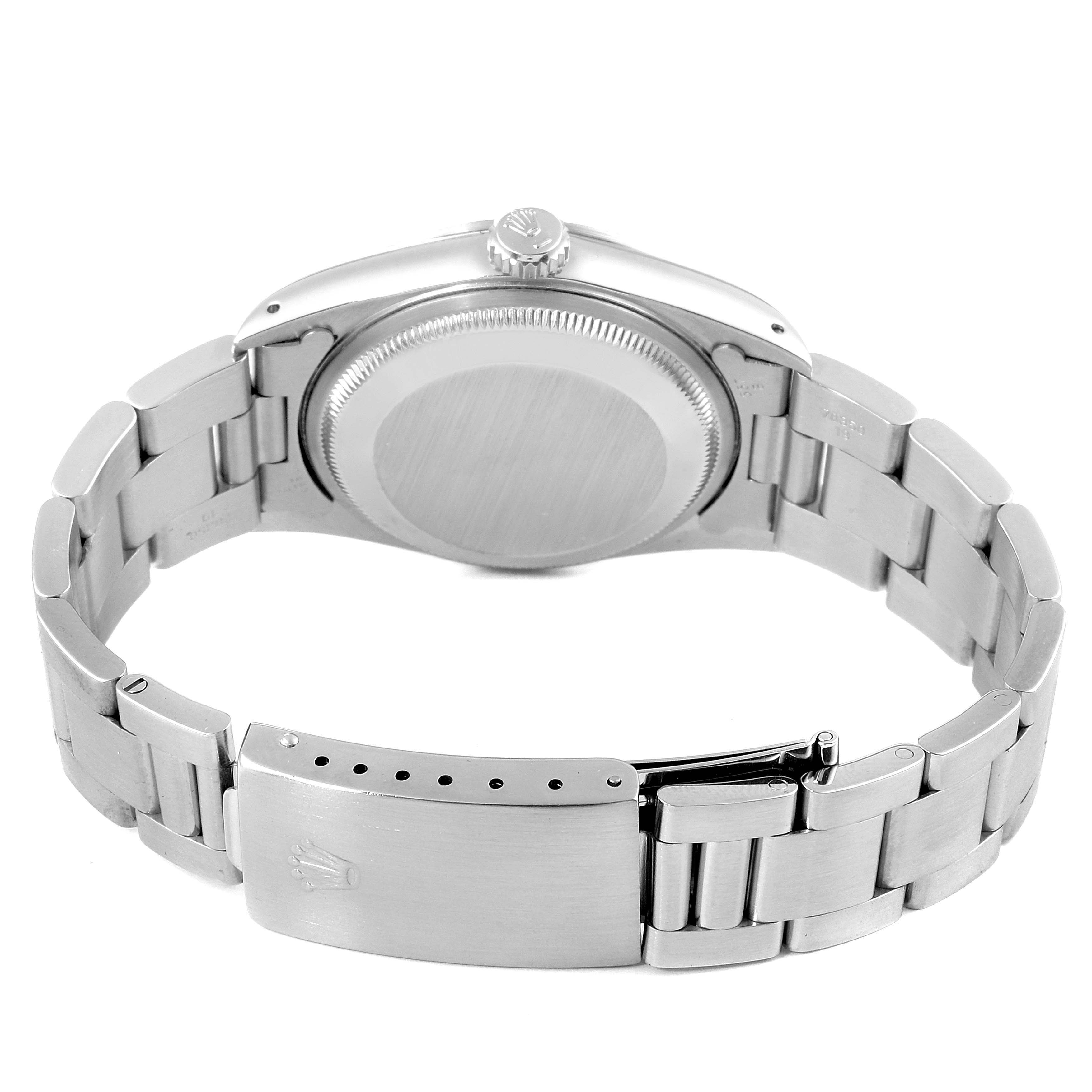 The image shows the back case and bracelet of a Rolex Date 15200 Men's Stainless Steel Silver Dial 15200 Men's Stainless Steel Silver Dial model watch.