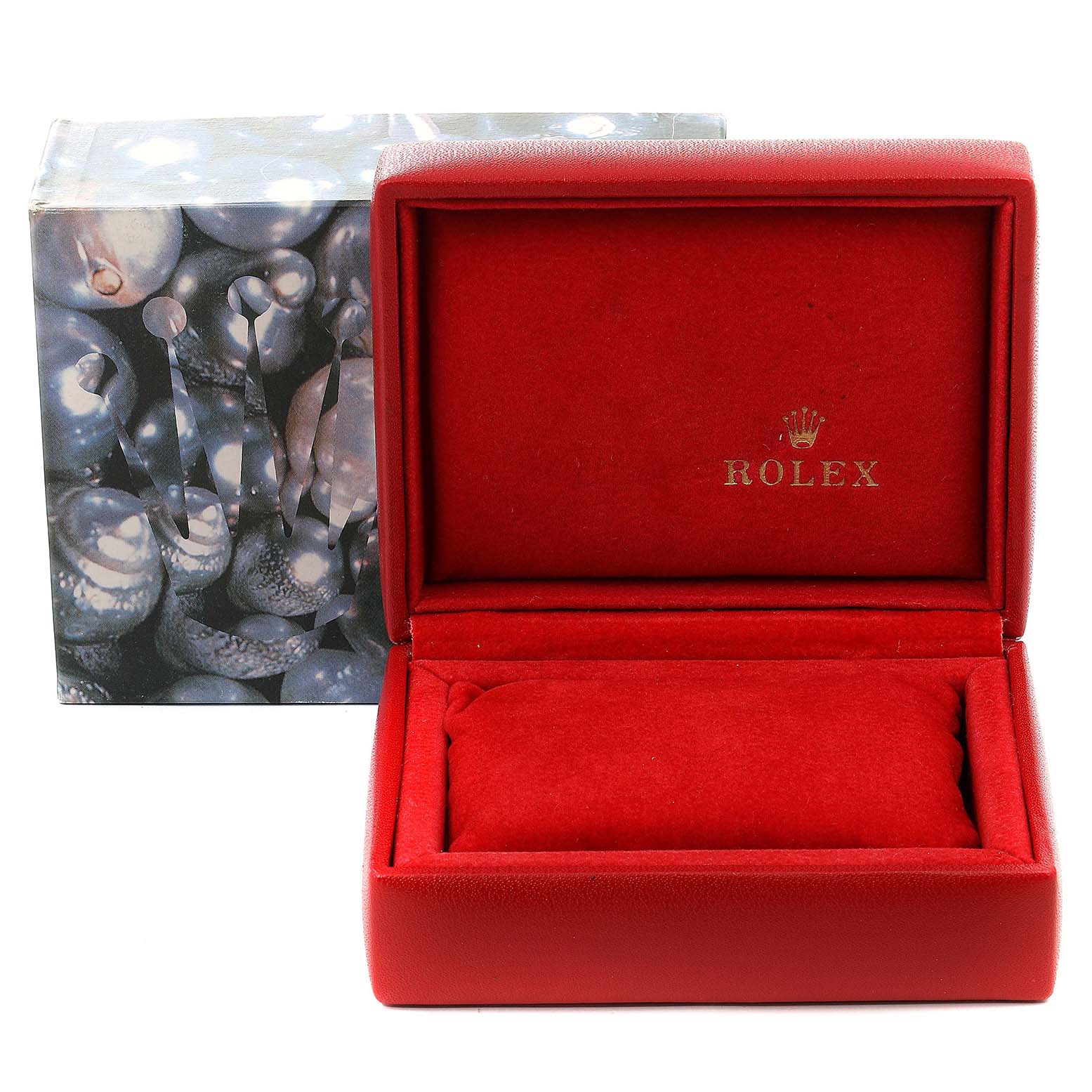 The image shows an open red Rolex box for a Datejust model, revealing an empty interior with a pillow and the Rolex logo.