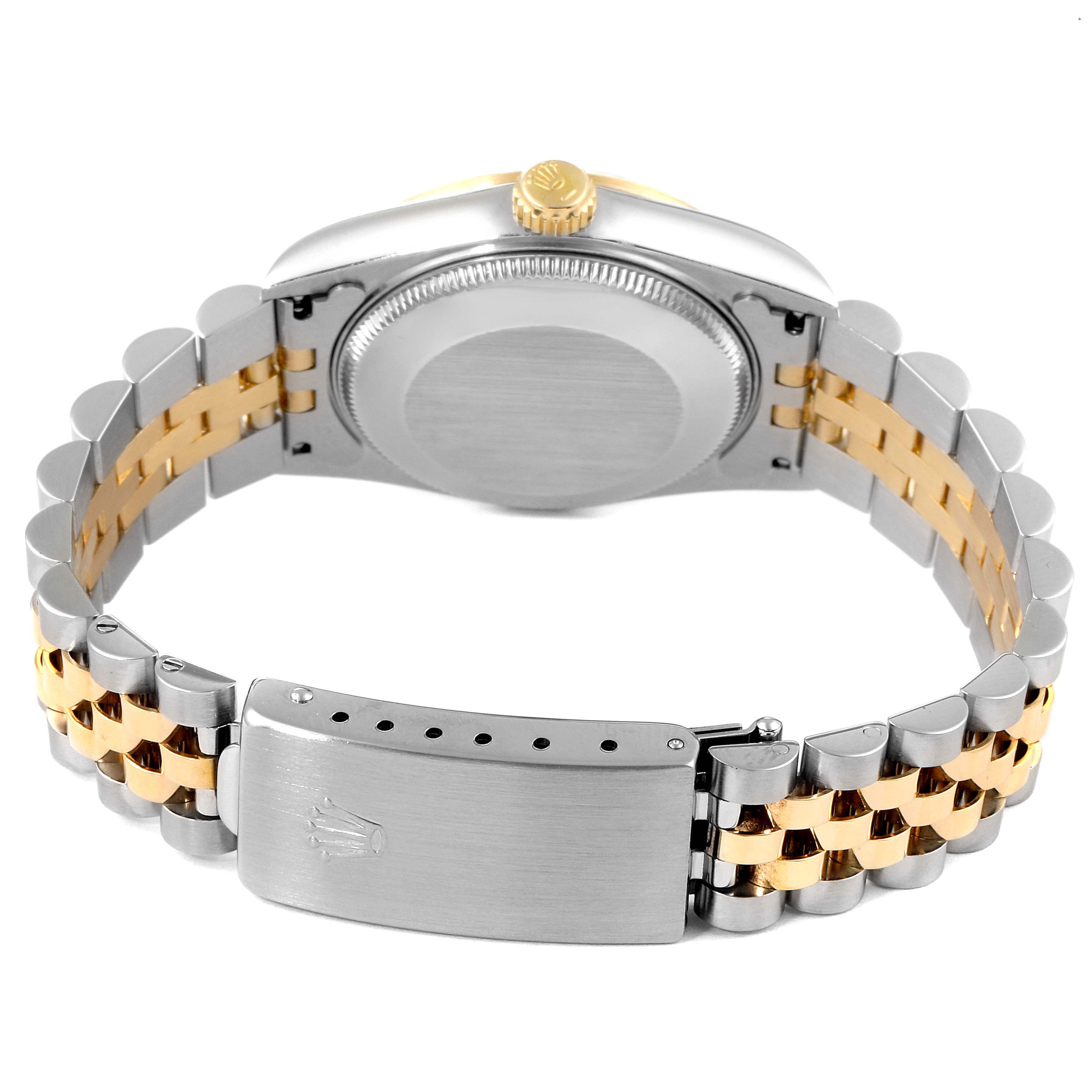 This image shows the back view of a Rolex Datejust 68273 Women
s Steel and Gold (two tone) White Dial 68273 Women
s Steel and Gold (two tone) White Dial watch, highlighting the case back, crown, and two-tone jubilee bracelet with clasp.
