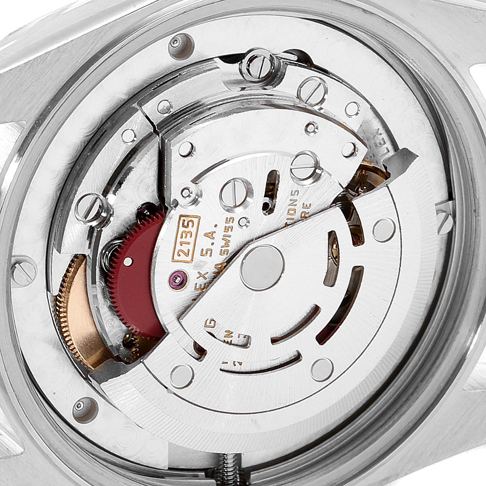 This image shows a close-up view of the movement mechanism inside a Rolex Datejust 68273 Women
s Steel and Gold (two tone) White Dial 68273 Women
s Steel and Gold (two tone) White Dial watch.