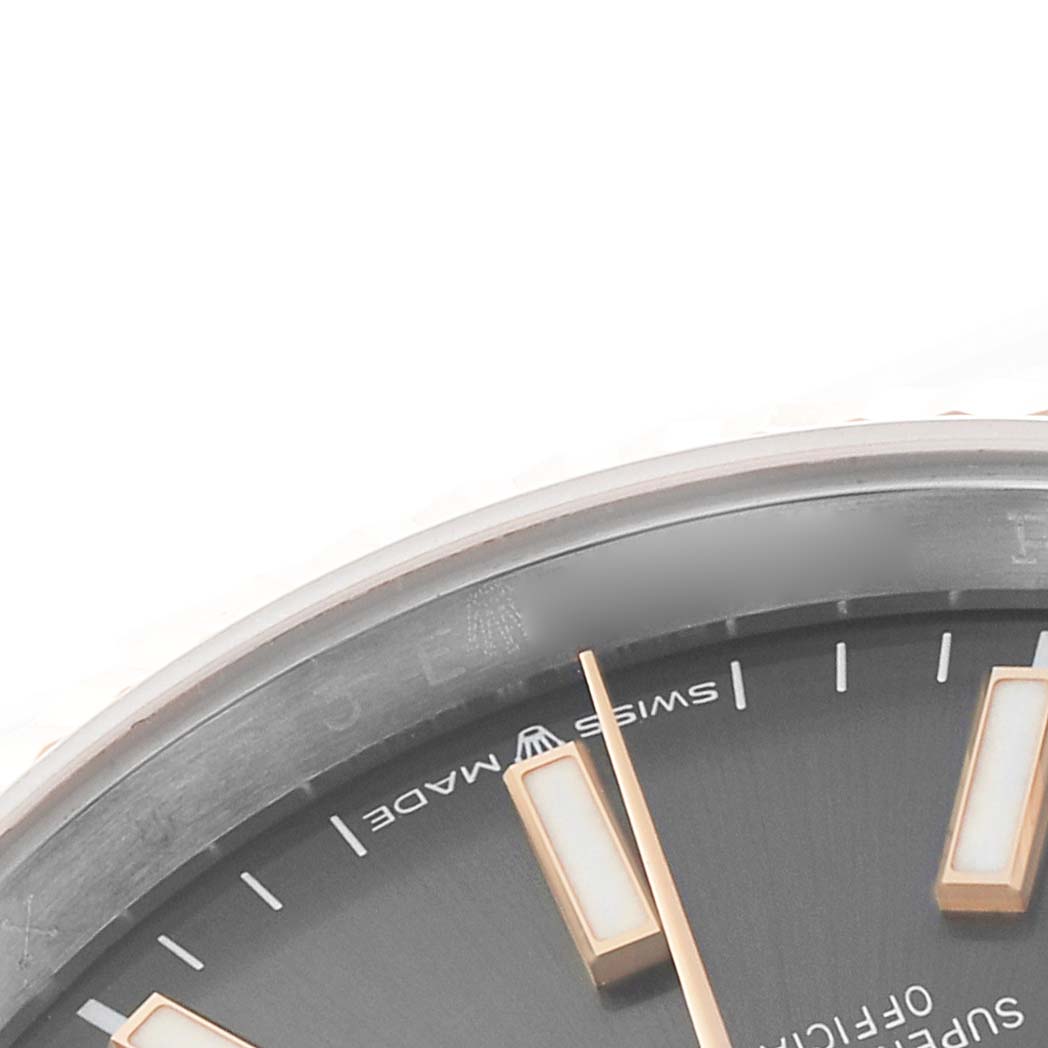 The image shows a close-up of the dial and bezel of the Rolex Datejust 126231 Men's Stainless Steel Grey Dial watch, displaying the hour markers and part of the text.