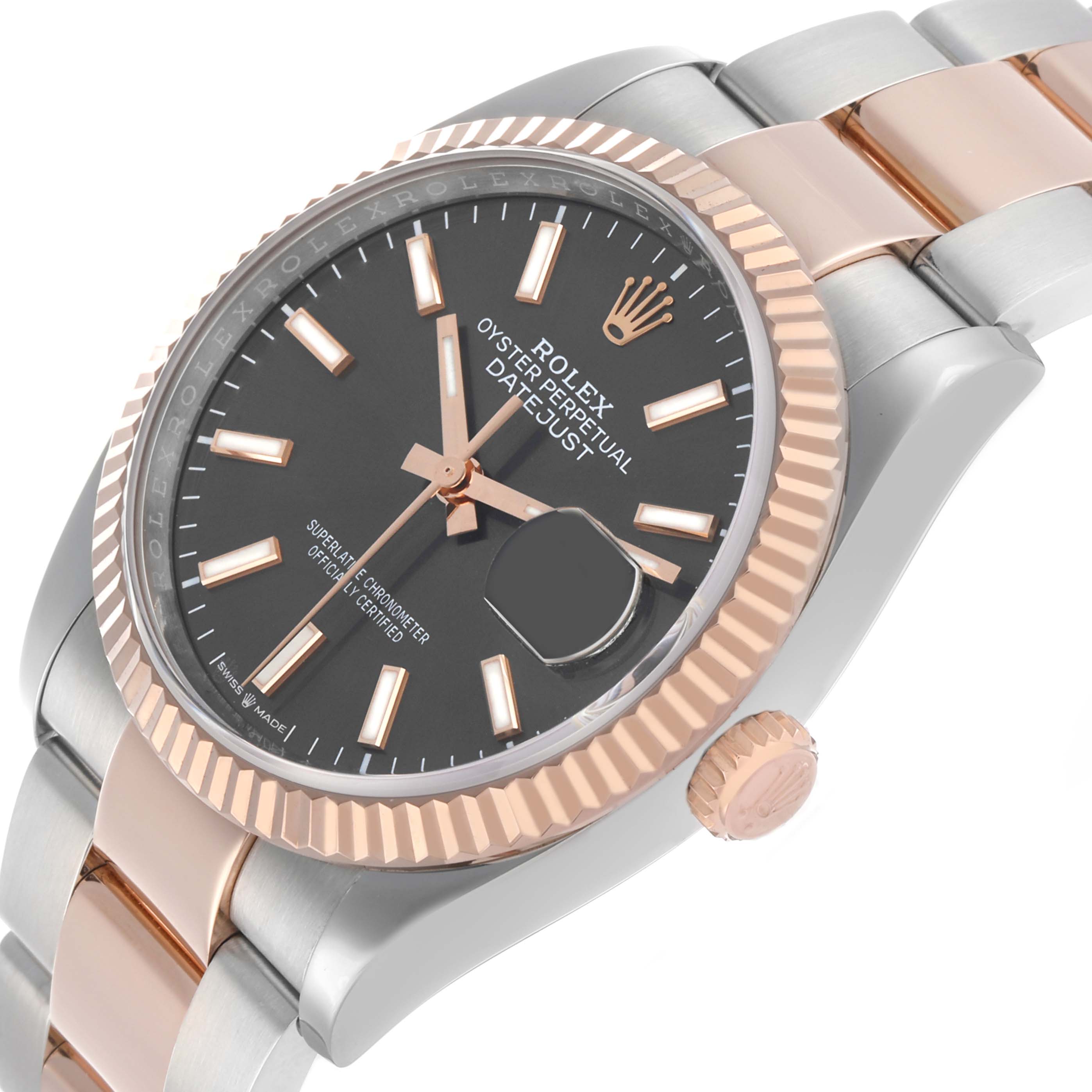 The Rolex Datejust 126231 Men's Stainless Steel Grey Dial watch is shown at a three-quarter angle, highlighting the dial, fluted bezel, and bracelet.