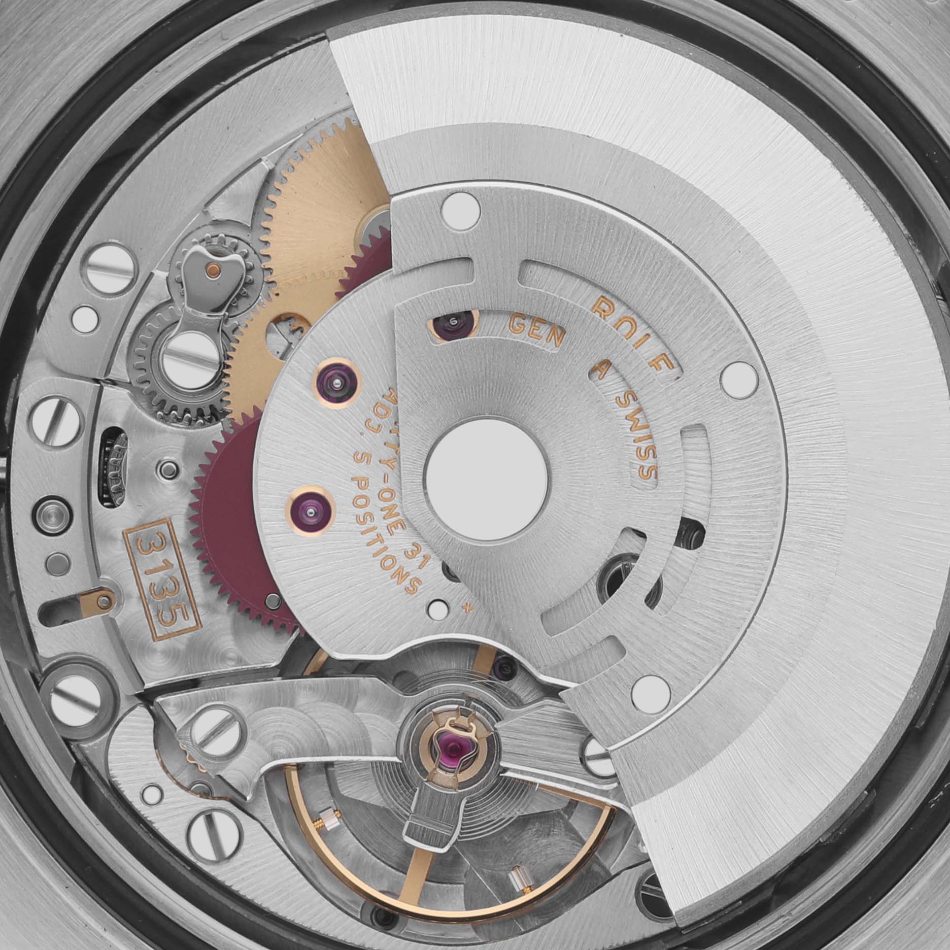 The image shows the movement mechanism of a Rolex Datejust 116139 Men's White Gold Silver Dial 116139 Men's White Gold Silver Dial, highlighting gears and intricate components from a top view.