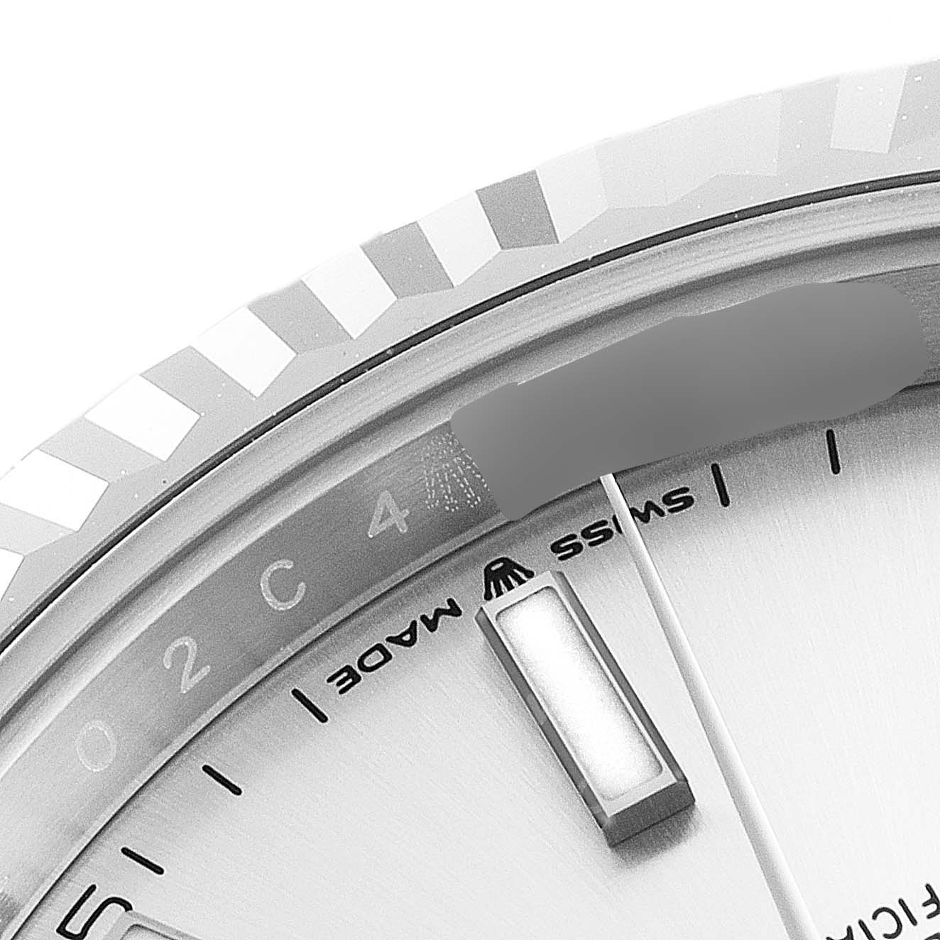 This close-up angle of a Rolex Datejust 41 126334 Men's Stainless Steel Silver Dial 126334 Men's Stainless Steel Silver Dial model watch shows the dial, bezel, and part of the hour marker.