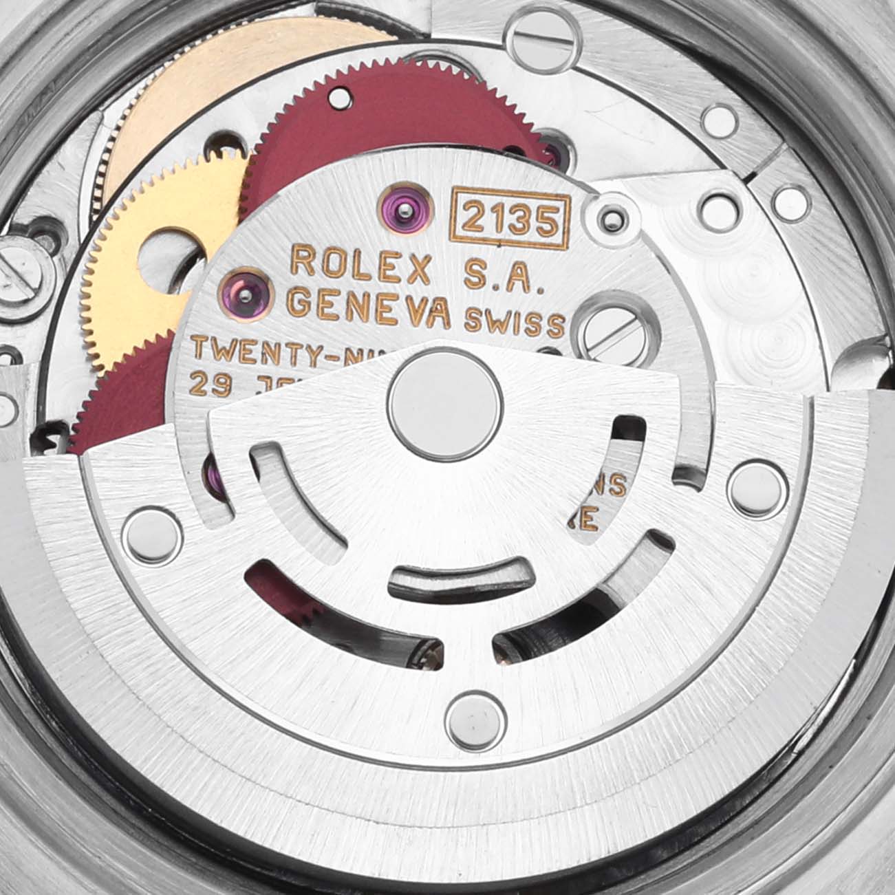 The image shows the internal movement of a Rolex Datejust 69173 Women's Steel and Gold (two tone) Blue Dial 69173 Women's Steel and Gold (two tone) Blue Dial watch, focusing on gears and the rotor.