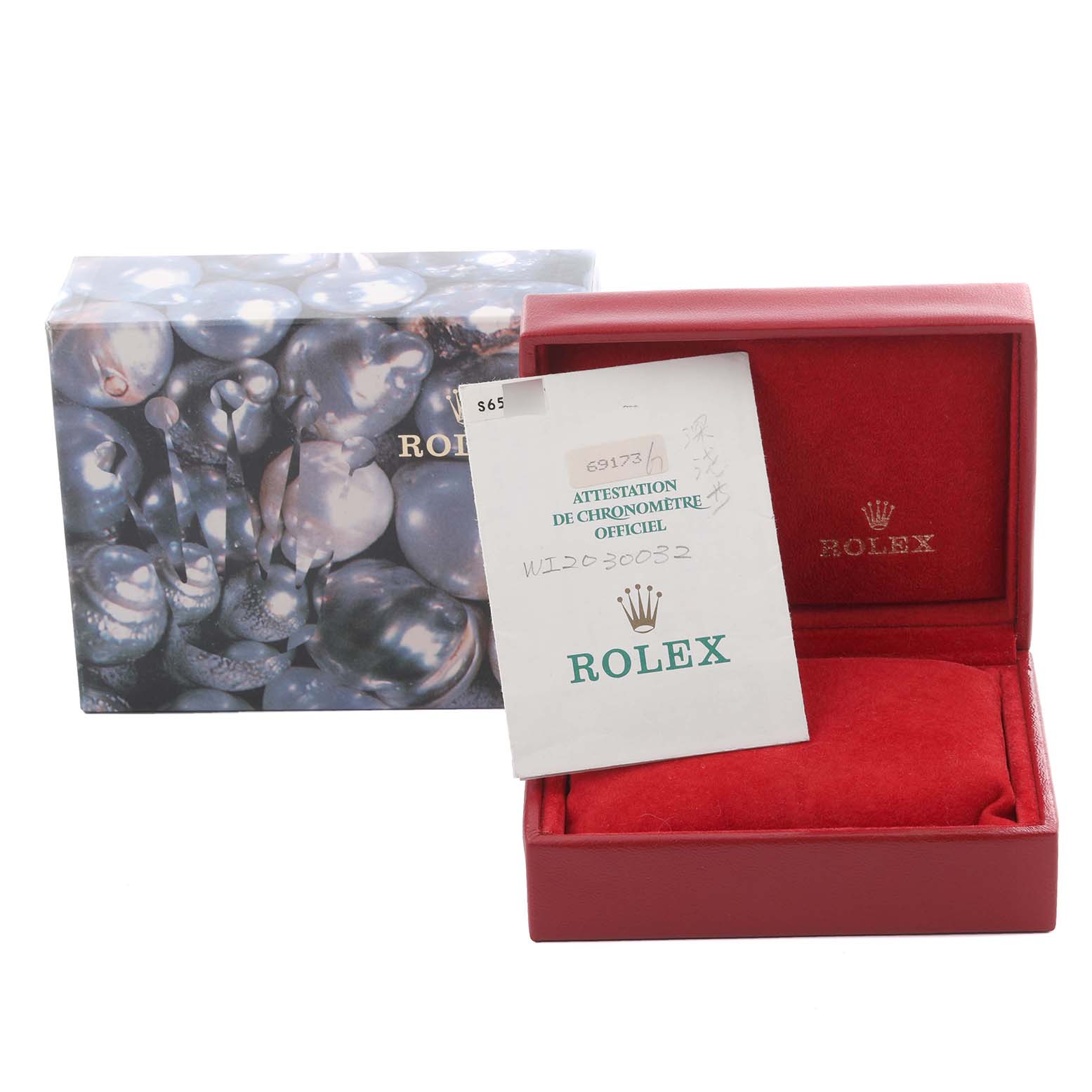 The image shows a Rolex Datejust 69173 Women's Steel and Gold (two tone) Blue Dial 69173 Women's Steel and Gold (two tone) Blue Dial watch box and warranty card at a slight angle.