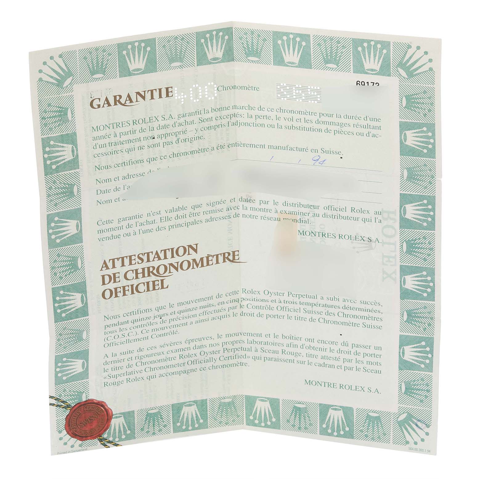 The image shows a Rolex Datejust 69173 Women's Steel and Gold (two tone) Blue Dial 69173 Women's Steel and Gold (two tone) Blue Dial warranty certificate with a green bordered design and red seal.