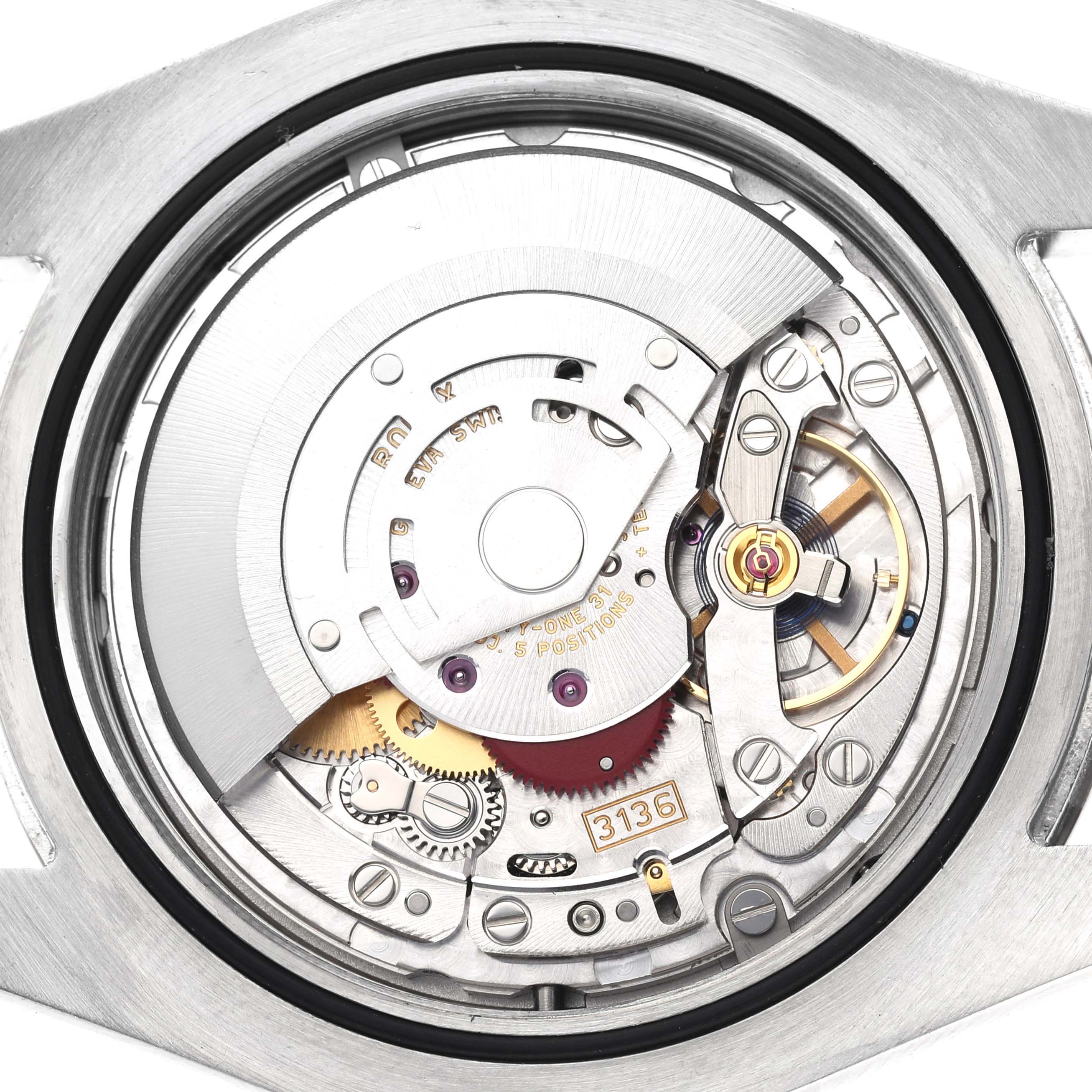 The image shows the movement mechanism of the Rolex Datejust 41 116334 Men's Stainless Steel Blue Dial 116334 Men's Stainless Steel Blue Dial, viewed from the back with intricate gears and components.