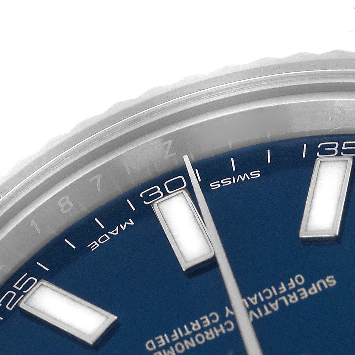 The image shows a close-up of the dial and bezel of a Rolex Datejust 41 116334 Men's Stainless Steel Blue Dial 116334 Men's Stainless Steel Blue Dial, highlighting the hour markers and minute track.