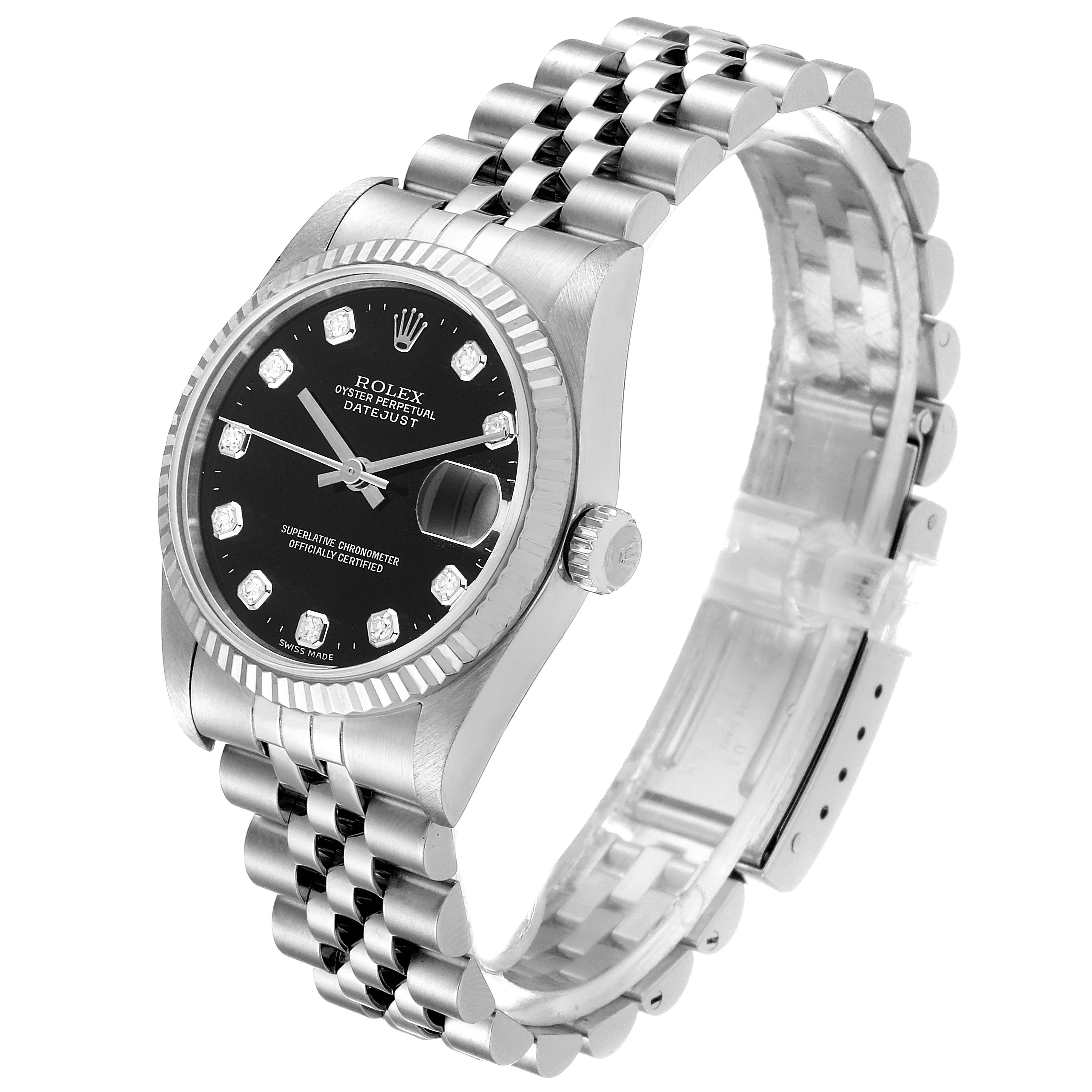This image features a Rolex Mid-Size 68274 Women
s Stainless Steel Black Dial 68274 Women
s Stainless Steel Black Dial Oyster Perpetual Datejust watch, showcasing its face, bezel, crown, and Jubilee bracelet at a tilted front angle.