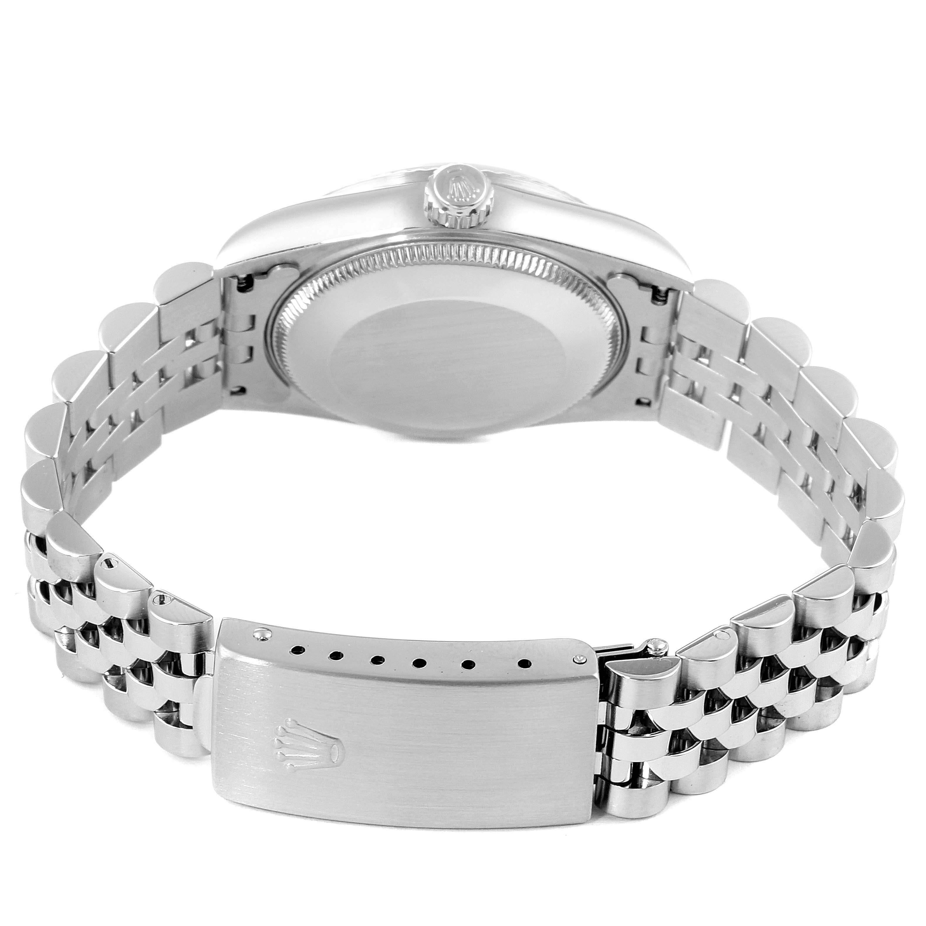 This image shows the back view of a Rolex Mid-Size 68274 Women
s Stainless Steel Black Dial 68274 Women
s Stainless Steel Black Dial watch, highlighting the case back and bracelet clasp.