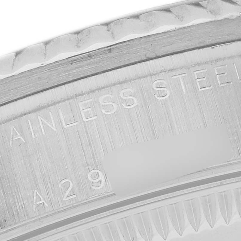 The image shows the side view of a Rolex Mid-Size 78274 Women's Stainless Steel White Dial 78274 Women's Stainless Steel White Dial watch case, highlighting the stainless steel engraving.