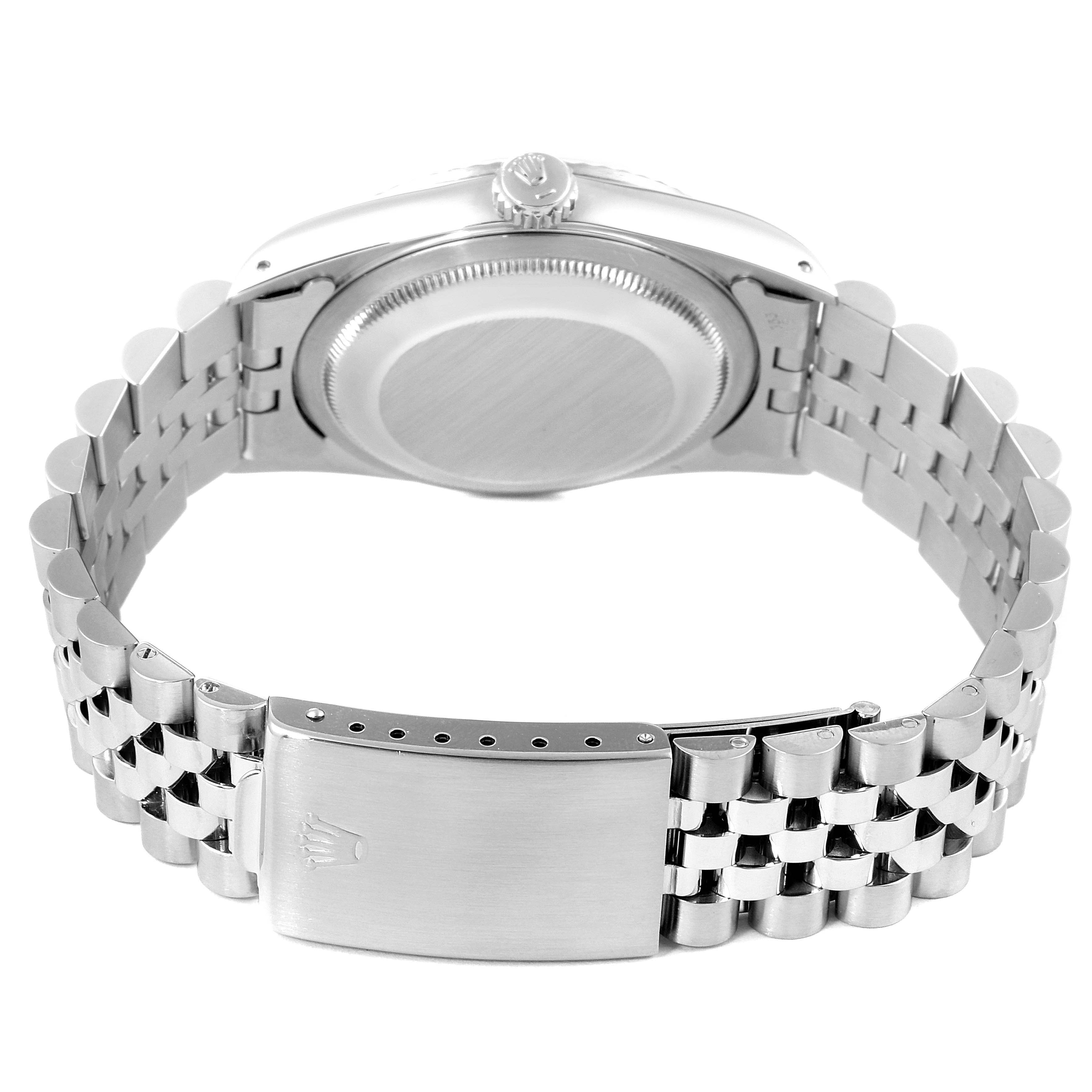 This is a rear view of the Rolex Datejust 16234 Men's Stainless Steel Silver Dial 16234 Men's Stainless Steel Silver Dial watch, showing its case back and Jubilee bracelet with clasp.