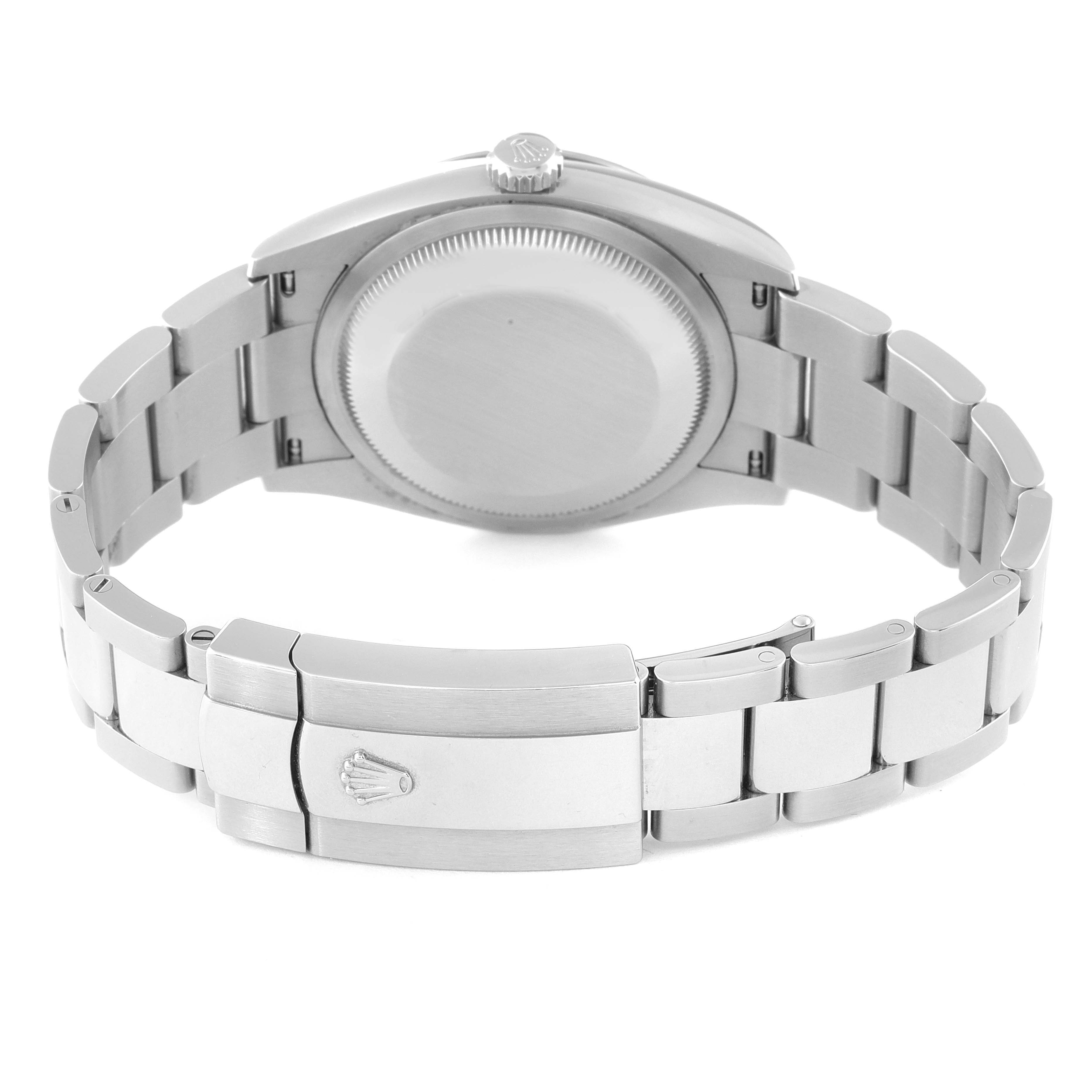 The image shows the back and clasp of a Rolex Datejust 126234 Men
s Stainless Steel Pink Dial 126234 Men
s Stainless Steel Pink Dial watch, highlighting its bracelet and case back.