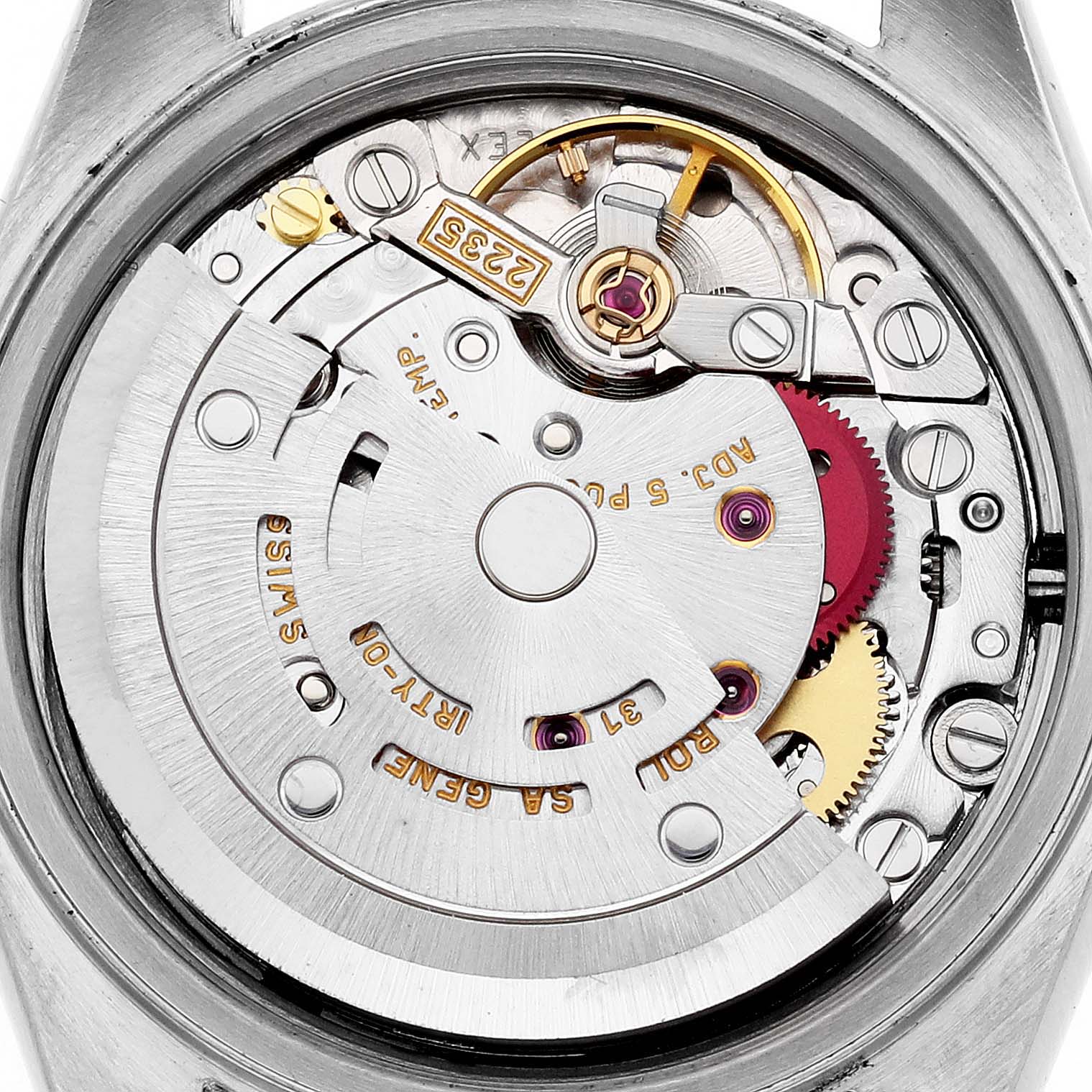 The image shows the movement of a Rolex Datejust 79174 Women's Stainless Steel White Dial 79174 Women's Stainless Steel White Dial watch from the back, revealing gears and components.