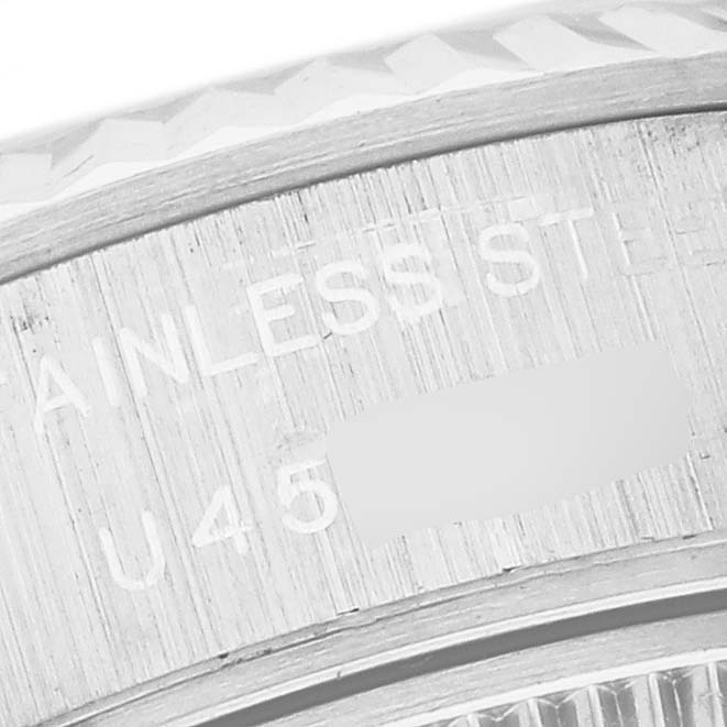 The image shows a close-up of the stainless steel case back of a Rolex Datejust 69174 Women's Stainless Steel White Dial 69174 Women's Stainless Steel White Dial watch.