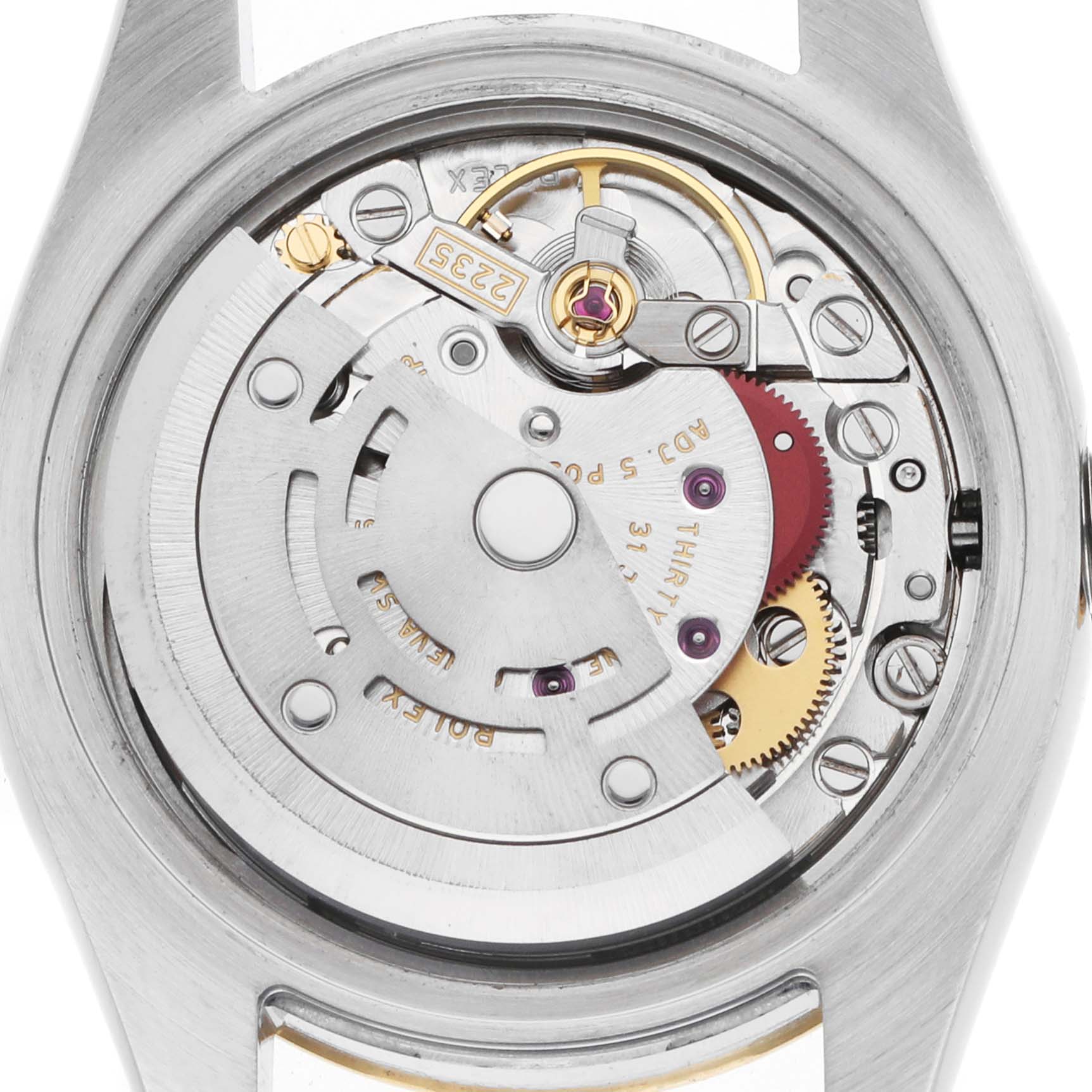 The image shows the movement of the Rolex Datejust 179173 Women's Steel and Gold (two tone) Champagne Dial from the back, revealing its intricate mechanical components.