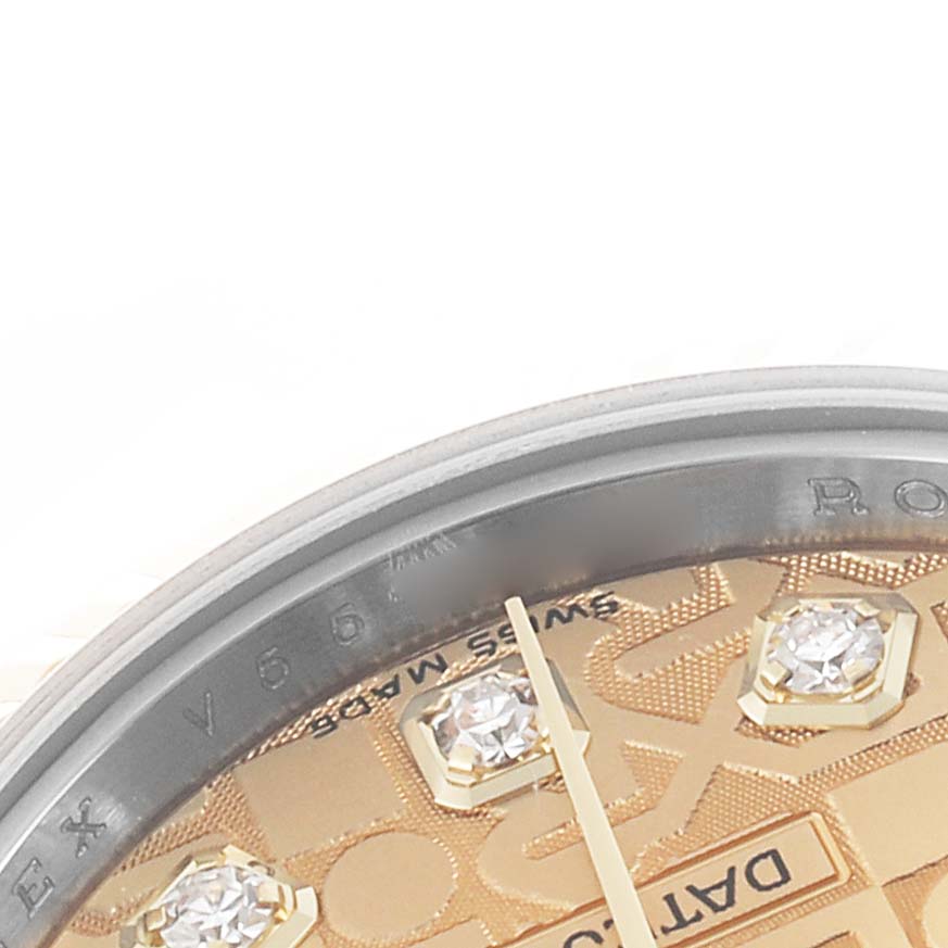 The image shows a partial view of the Rolex Datejust 179173 Women's Steel and Gold (two tone) Champagne Dial dial, focusing on the gold textured surface and diamond markers.