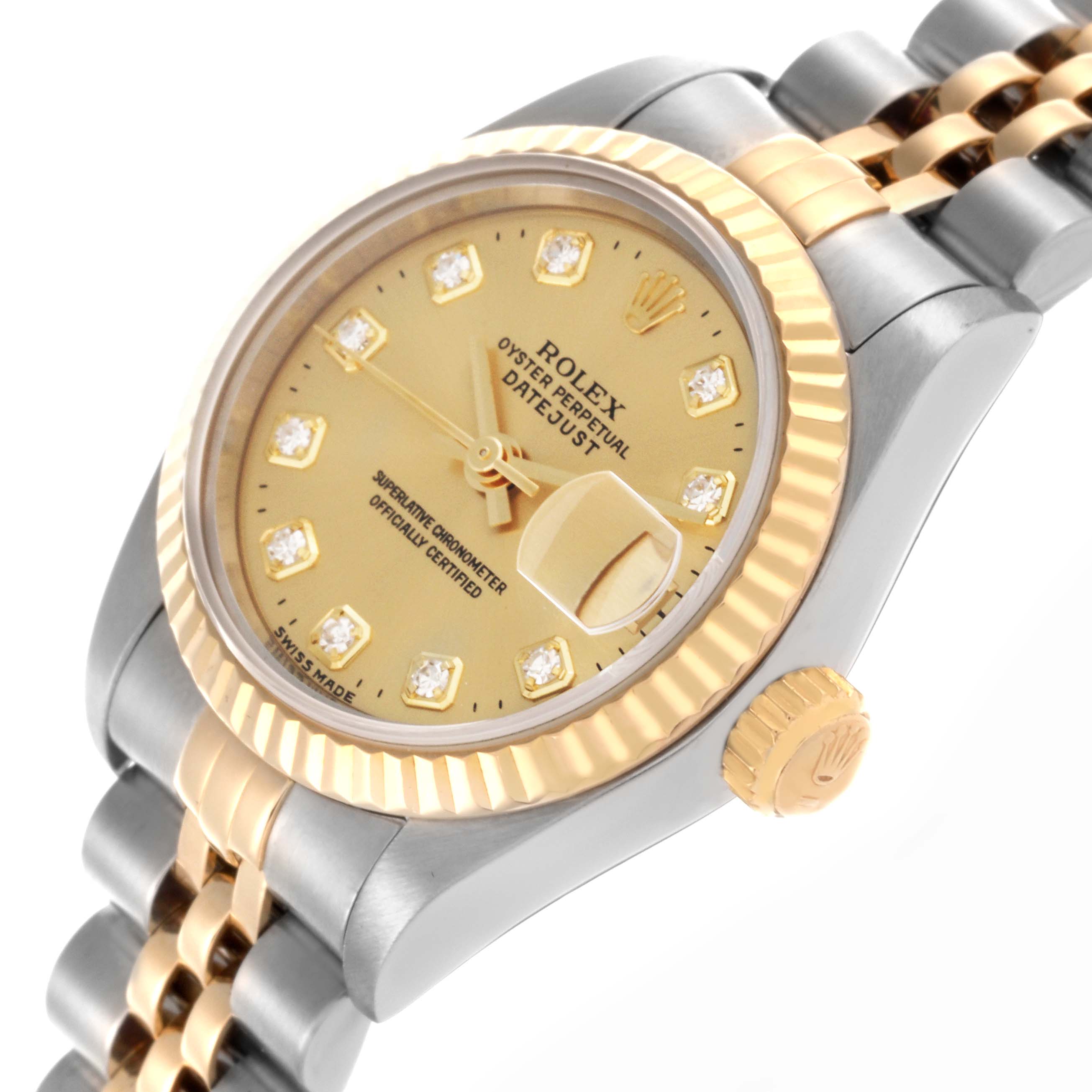 The Rolex Datejust 69173 Women
s Steel and Gold (two tone) Champagne Dial 69173 Women
s Steel and Gold (two tone) Champagne Dial watch is shown at a three-quarter angle, highlighting the gold dial, diamond markers, bezel, crown, and two-tone bracelet.