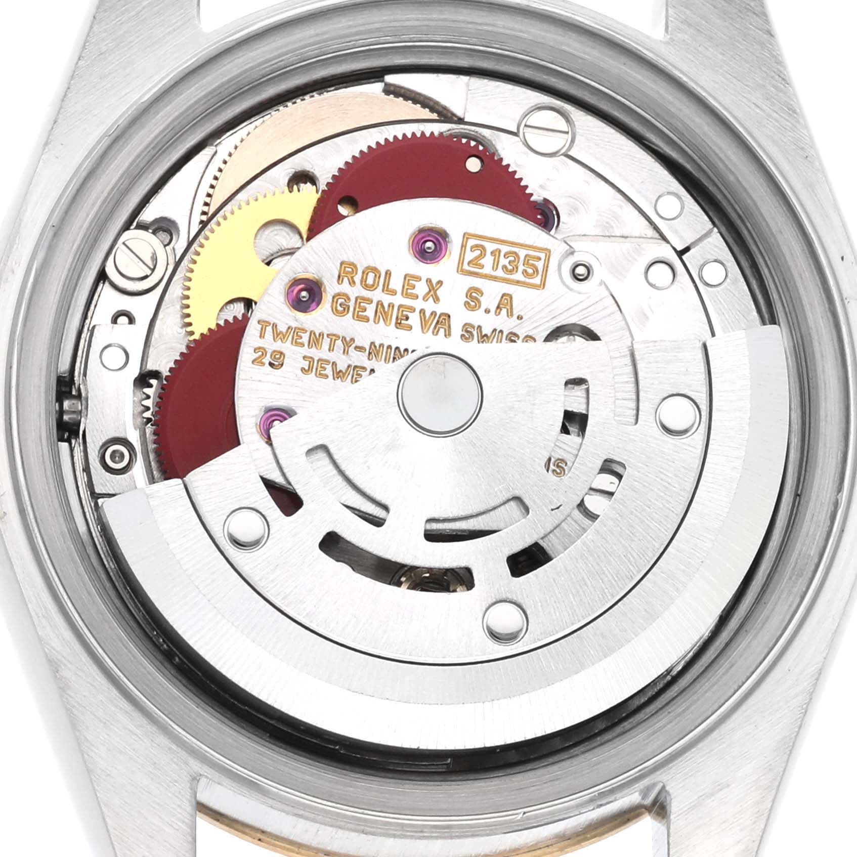 The Rolex Datejust 69173 Women
s Steel and Gold (two tone) Champagne Dial 69173 Women
s Steel and Gold (two tone) Champagne Dial watch is shown from the back, revealing the intricate movement and gears.