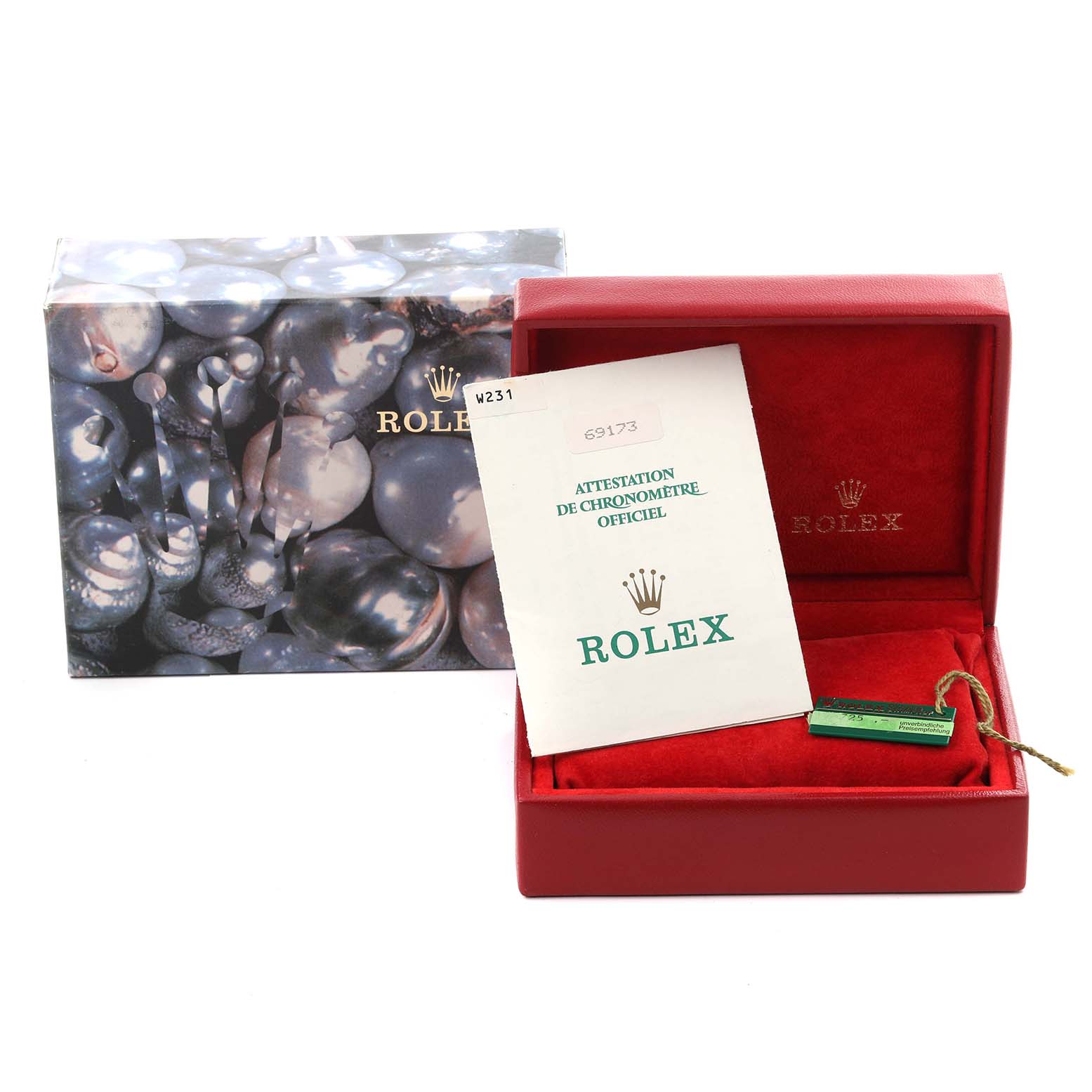 The image shows a Rolex Datejust 69173 Women
s Steel and Gold (two tone) Champagne Dial 69173 Women
s Steel and Gold (two tone) Champagne Dial box with manuals and a green tag, viewed from the front.