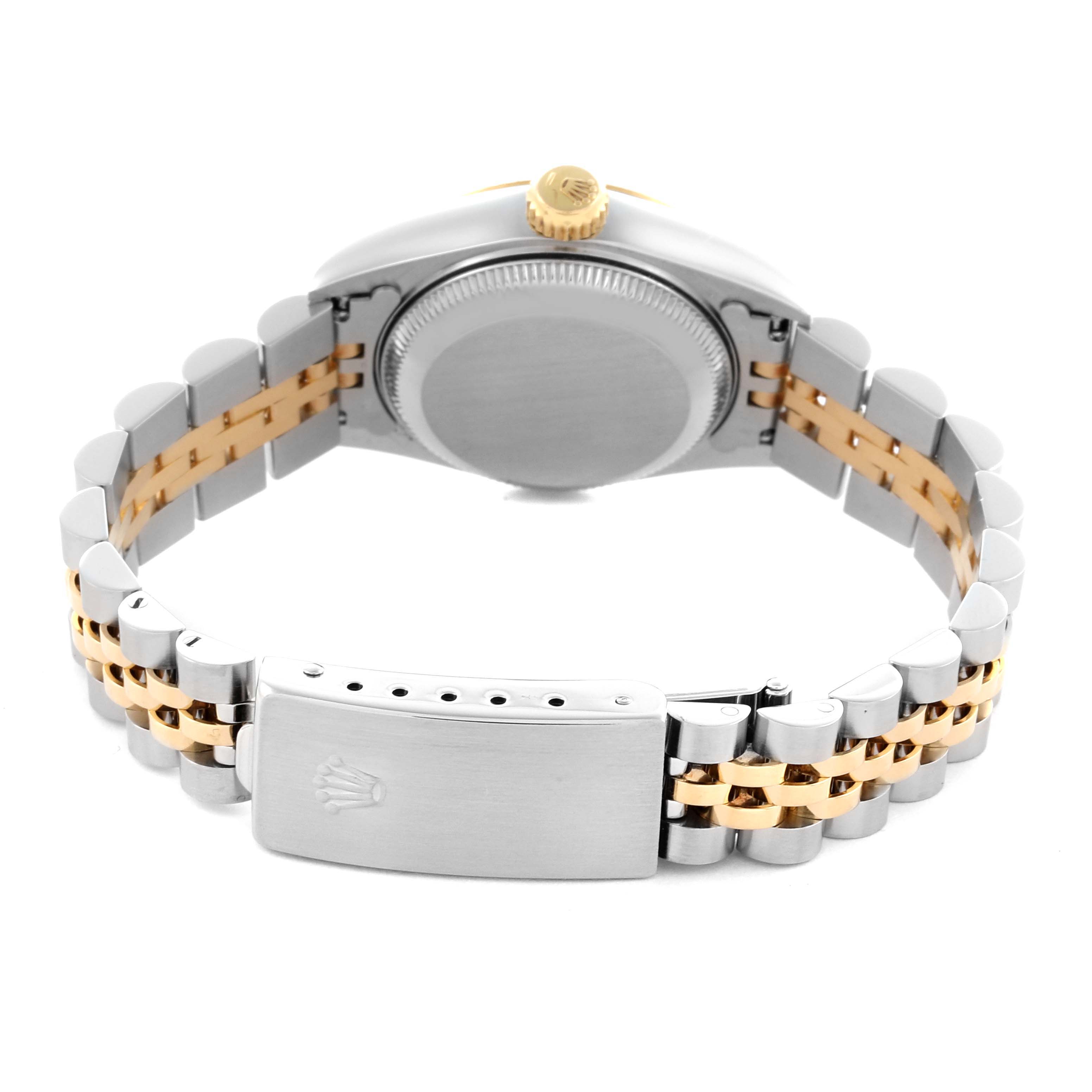 The Rolex Datejust 69173 Women
s Steel and Gold (two tone) Champagne Dial 69173 Women
s Steel and Gold (two tone) Champagne Dial is shown from the back, highlighting the case, crown, and two-tone band with clasp.