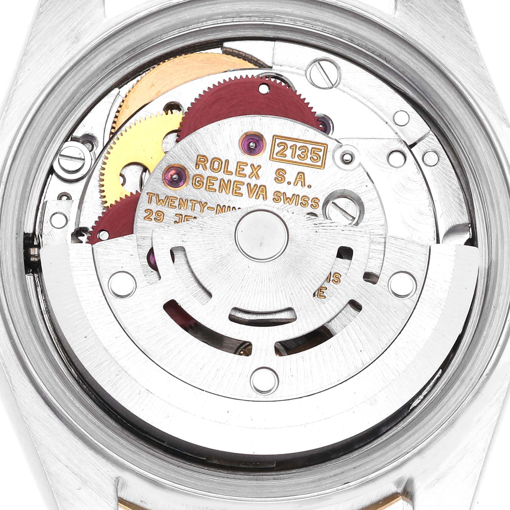 The image shows the movement and internal mechanism of the Rolex Datejust 69173 Women
s Steel and Gold (two tone) Champagne Dial 69173 Women
s Steel and Gold (two tone) Champagne Dial watch from a back angle.