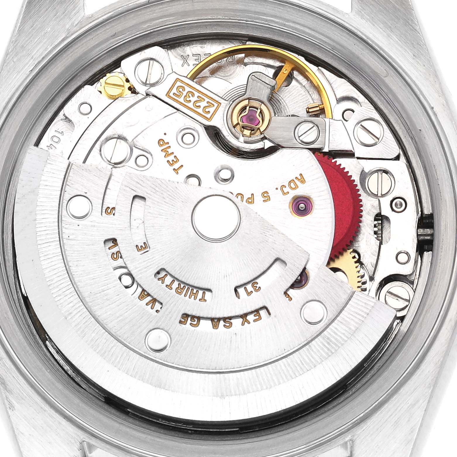 The image shows the movement of a Rolex Datejust 79173 Men's Steel and Gold (two tone) Champagne Dial 79173 Men's Steel and Gold (two tone) Champagne Dial watch, focusing on its intricate mechanical components.