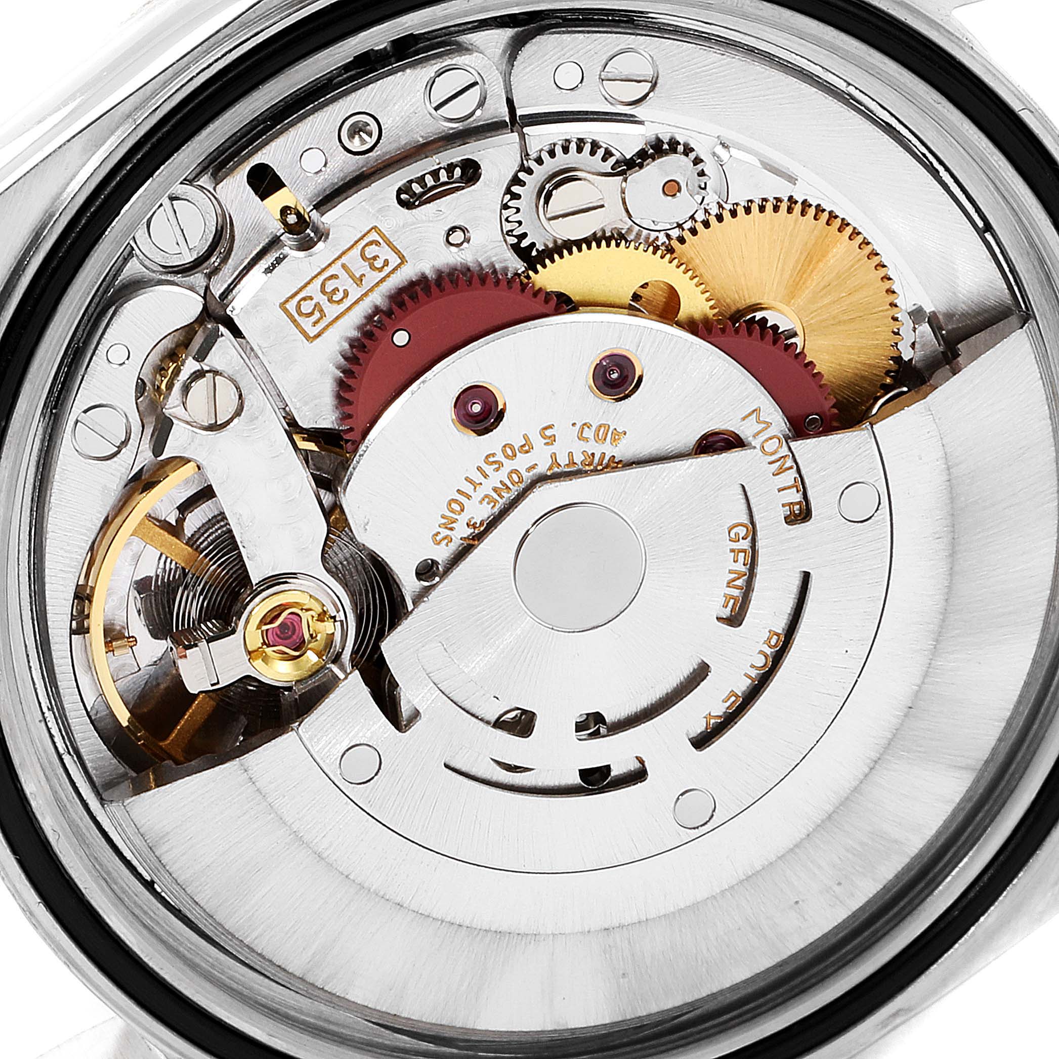 The image shows an up-close view of the internal mechanism of a Rolex Datejust 16233 Men's Steel and Gold (two tone) Champagne Dial 16233 Men's Steel and Gold (two tone) Champagne Dial watch.
